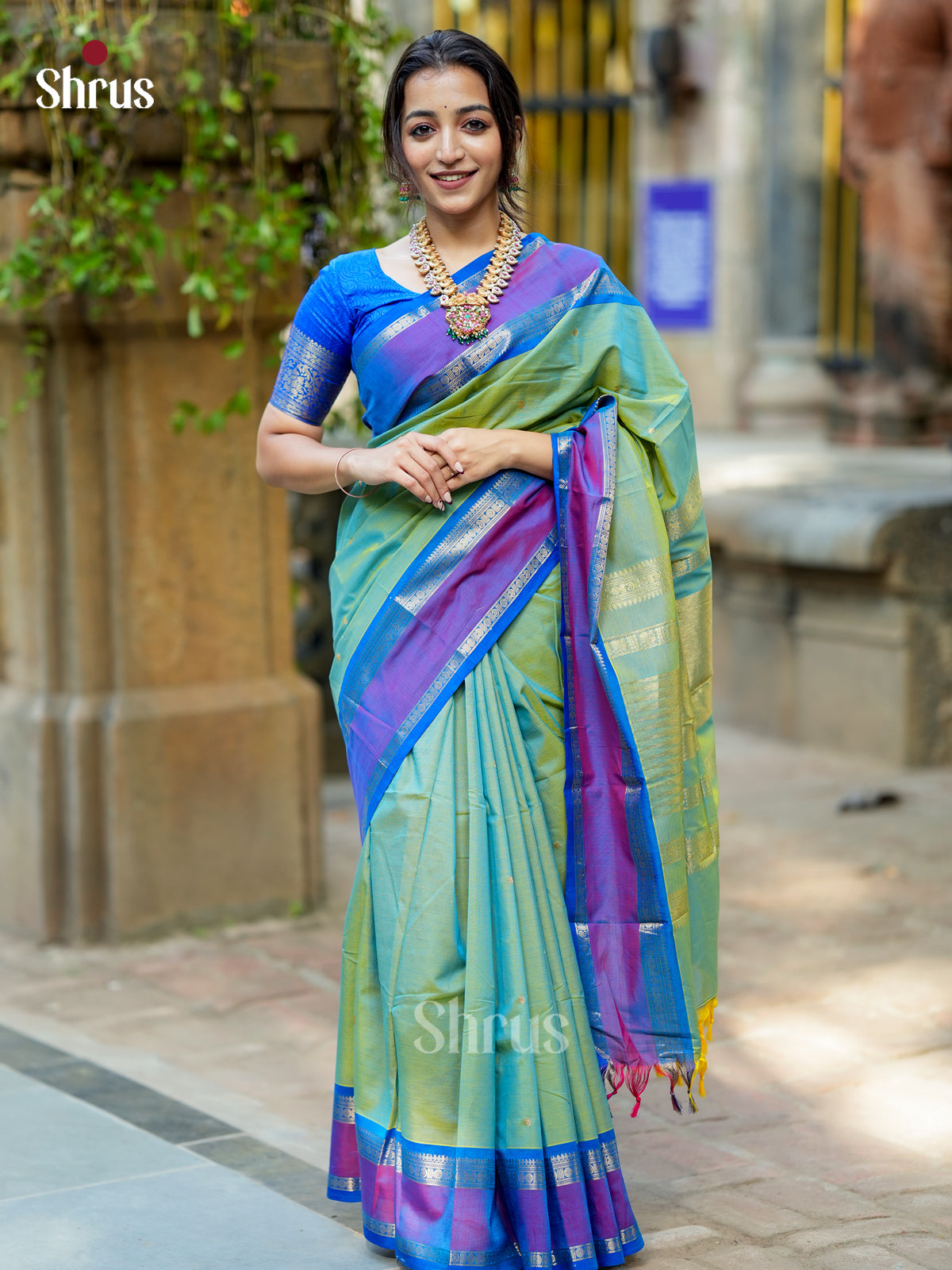 Serene Light Sea Green Chettinad Cotton Saree With Zari Buttas & Purple Rettapet Border
