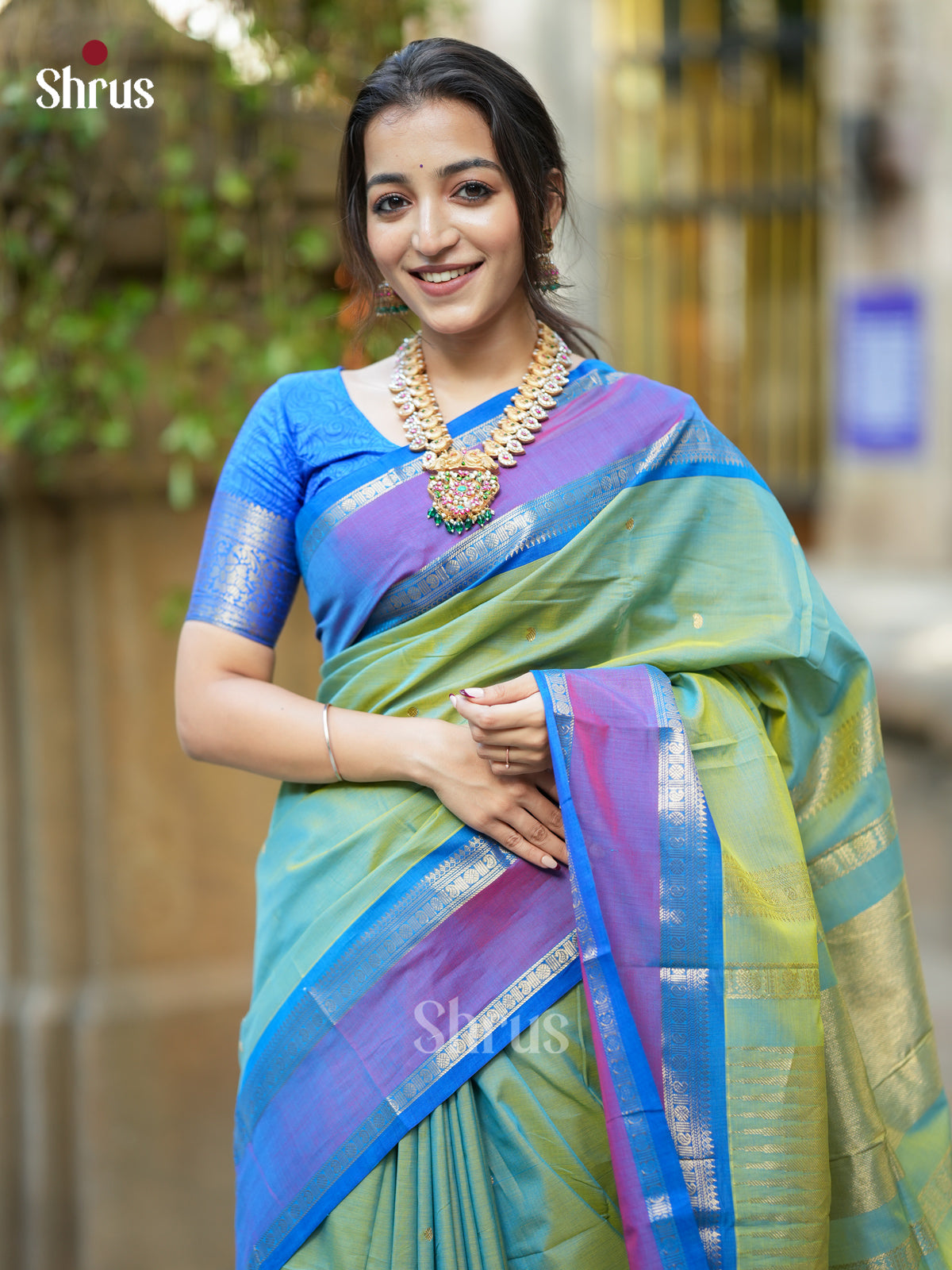 Serene Light Sea Green Chettinad Cotton Saree With Zari Buttas & Purple Rettapet Border