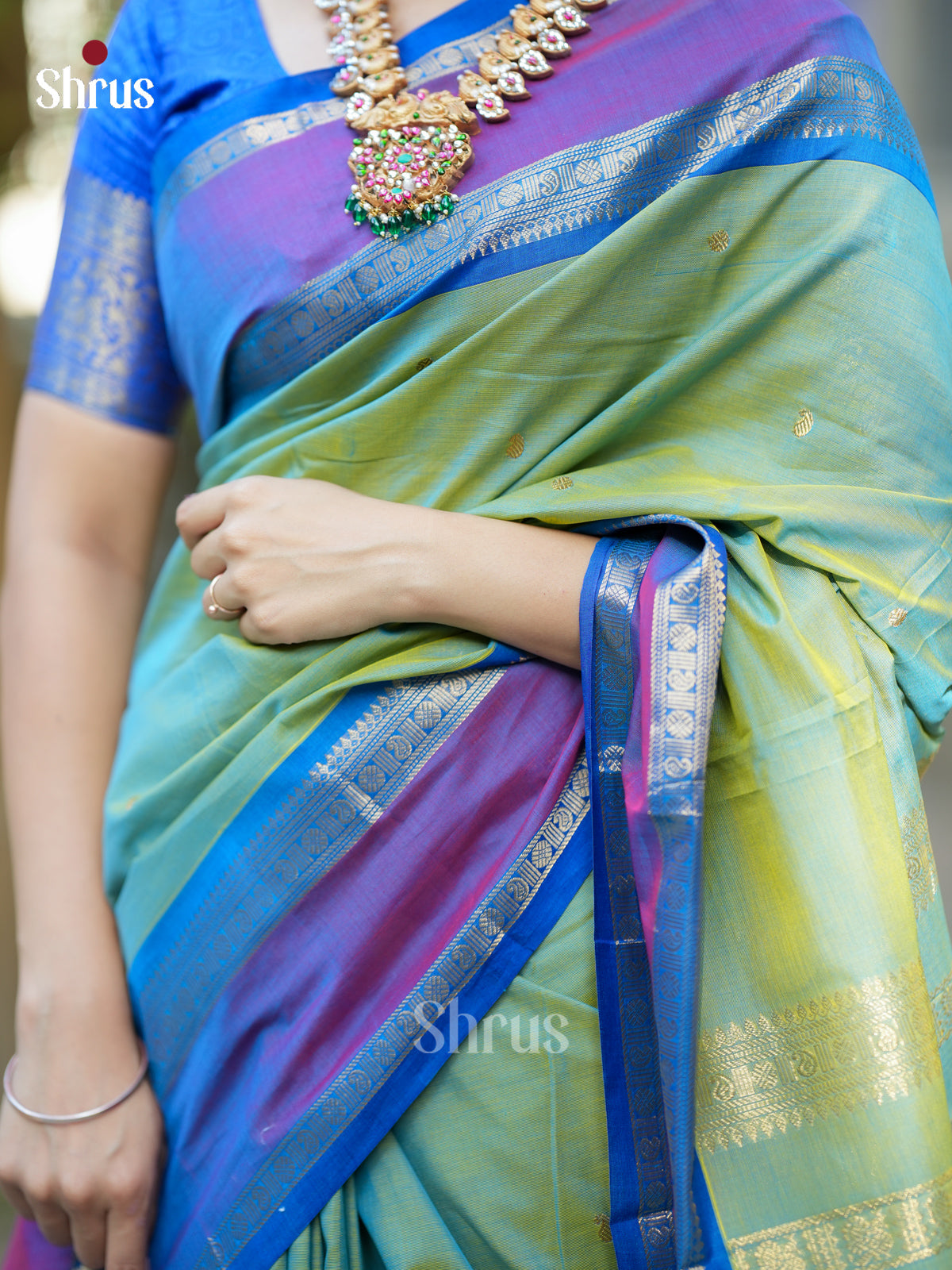 Serene Light Sea Green Chettinad Cotton Saree With Zari Buttas & Purple Rettapet Border - Shop on Shrus.com