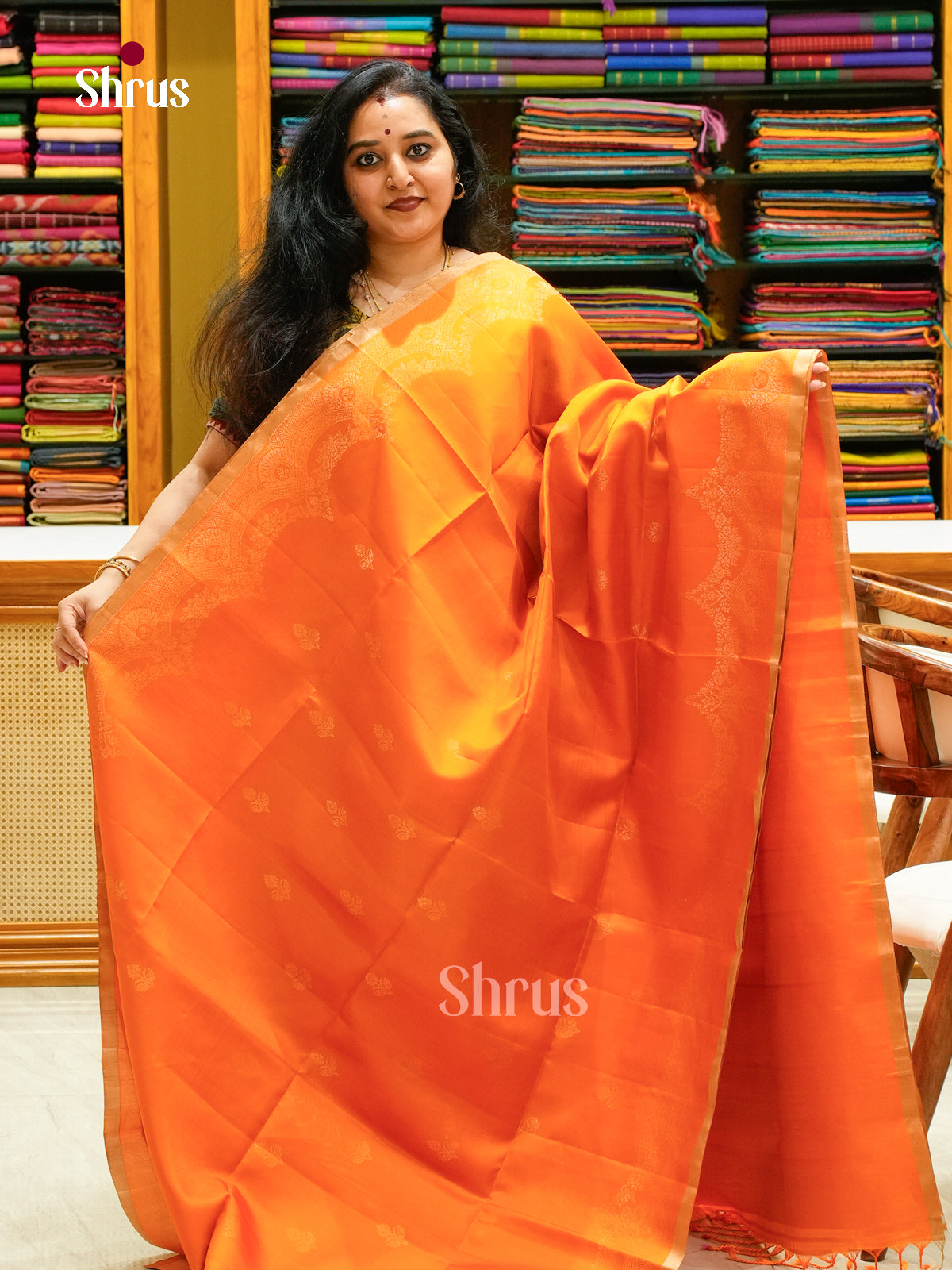 Orange Soft Silk Saree with Floral Buttas
