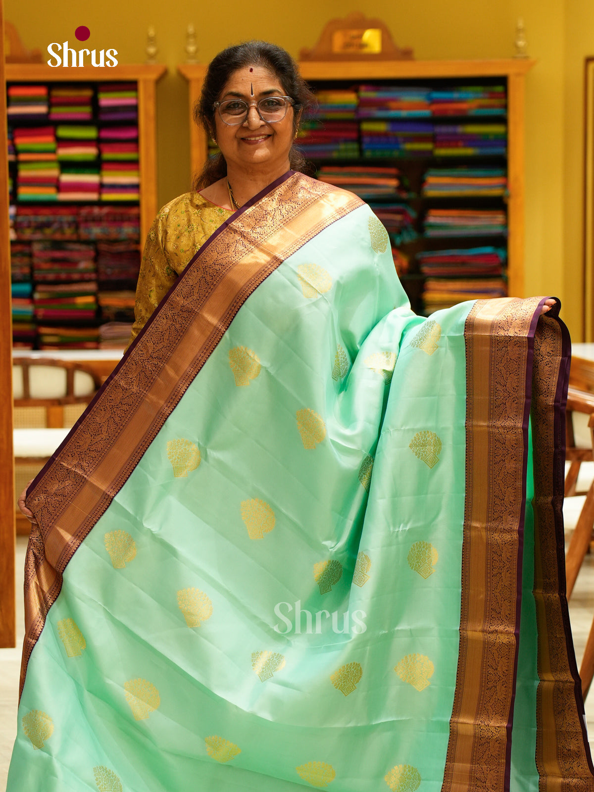 Blue Kanchipuram Silk Saree with Floral Buttas | Wine Contrast Border — EFS27294