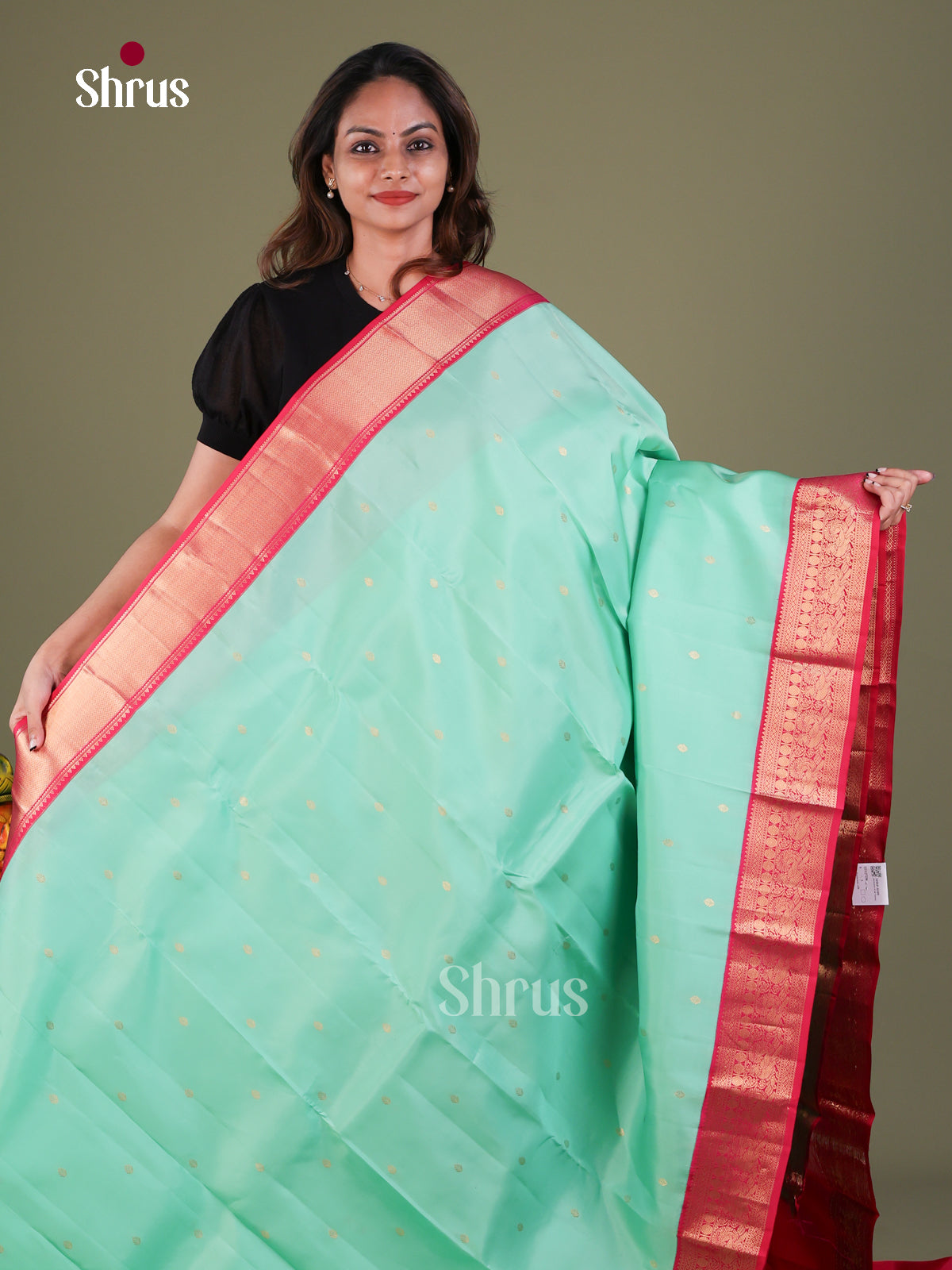 Sea Green Kanchipuram Silk Saree with Floral Buttas | Pink Contrast Border - Shop on Shrus.com