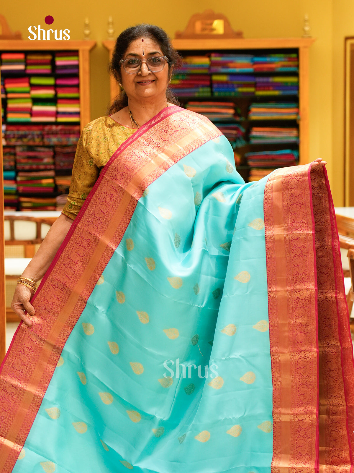 Blue Kanchipuram Silk Saree with Floral Buttas | Pink Contrast Border — EFS27298