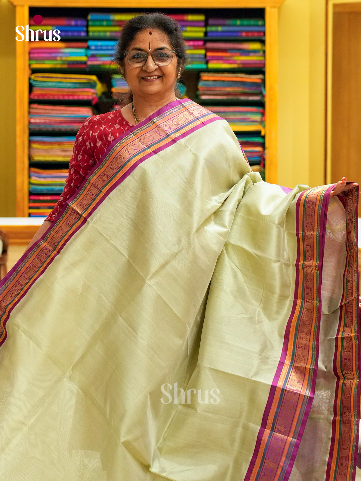 Pista Green Silk Cotton Saree | Magenta Contrast Border