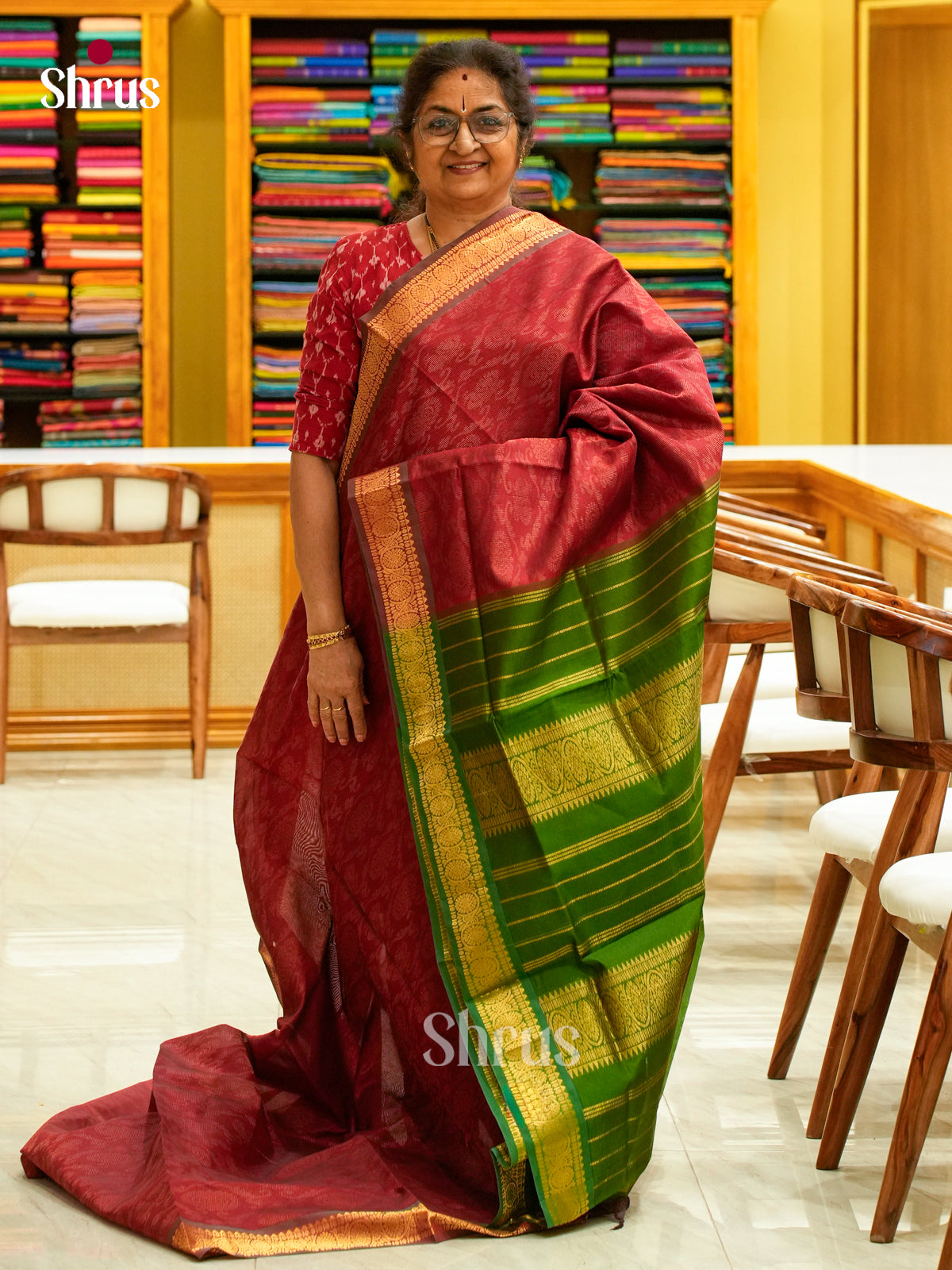 Maroon Silk Cotton Saree with Brocade and Floral Nestling Brocade | Dark Green Contrast Border