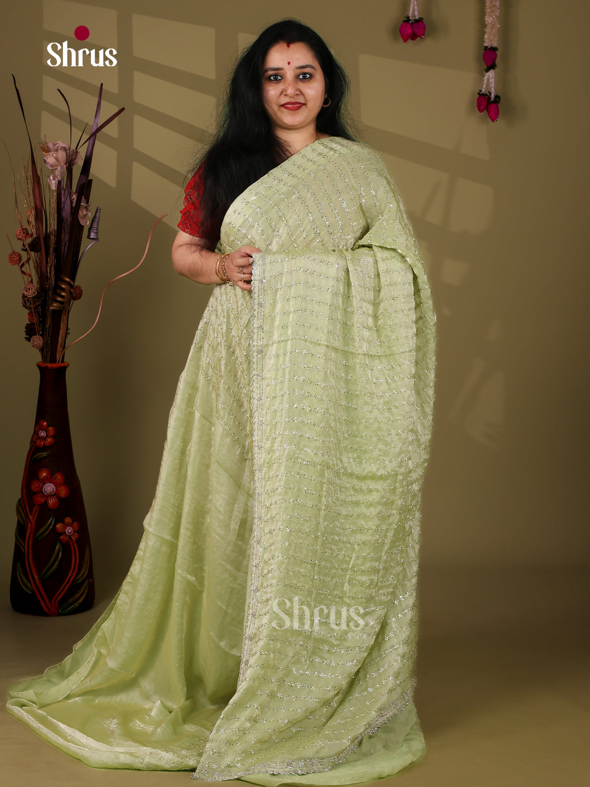 Beautiful Light Green Designer Saree with stone work