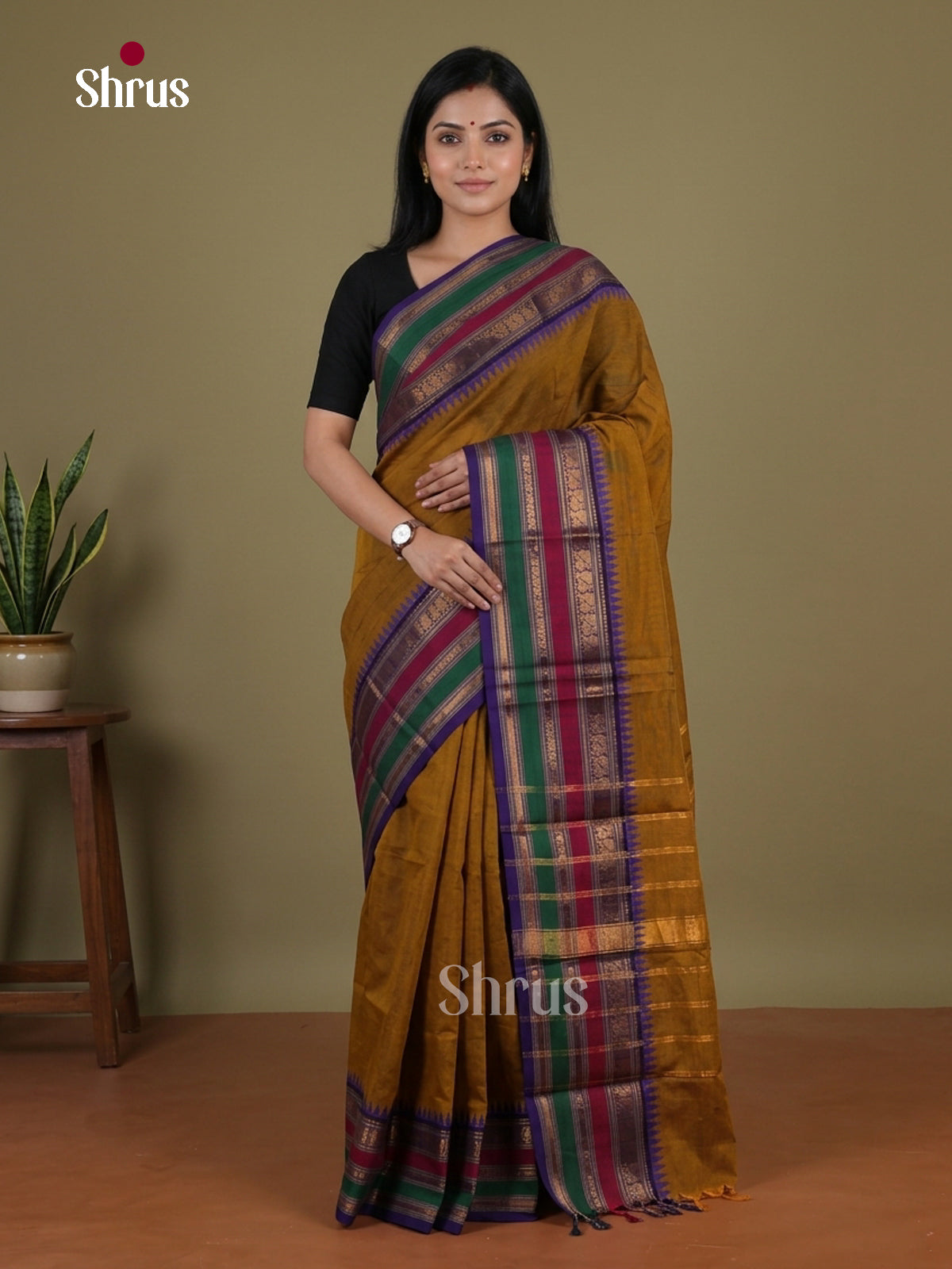 Elegant Dark Mustard Chettinad Saree With Plain Body & Temple Border With Multicoloured Zari Bands
