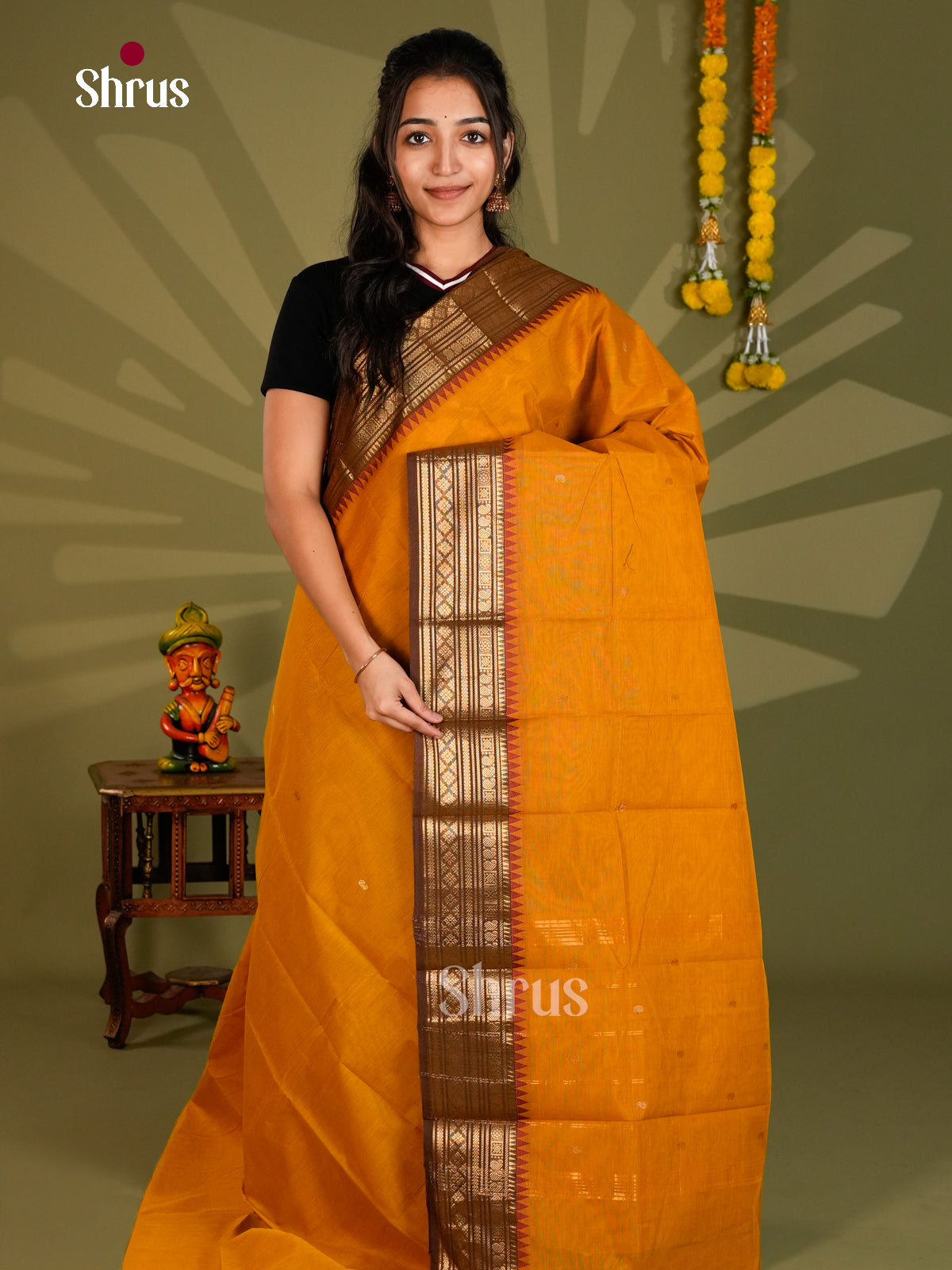 Elegant Mustard Chettinad Cotton Saree With golden Buttas & Brown Temple Border With Zari Bands