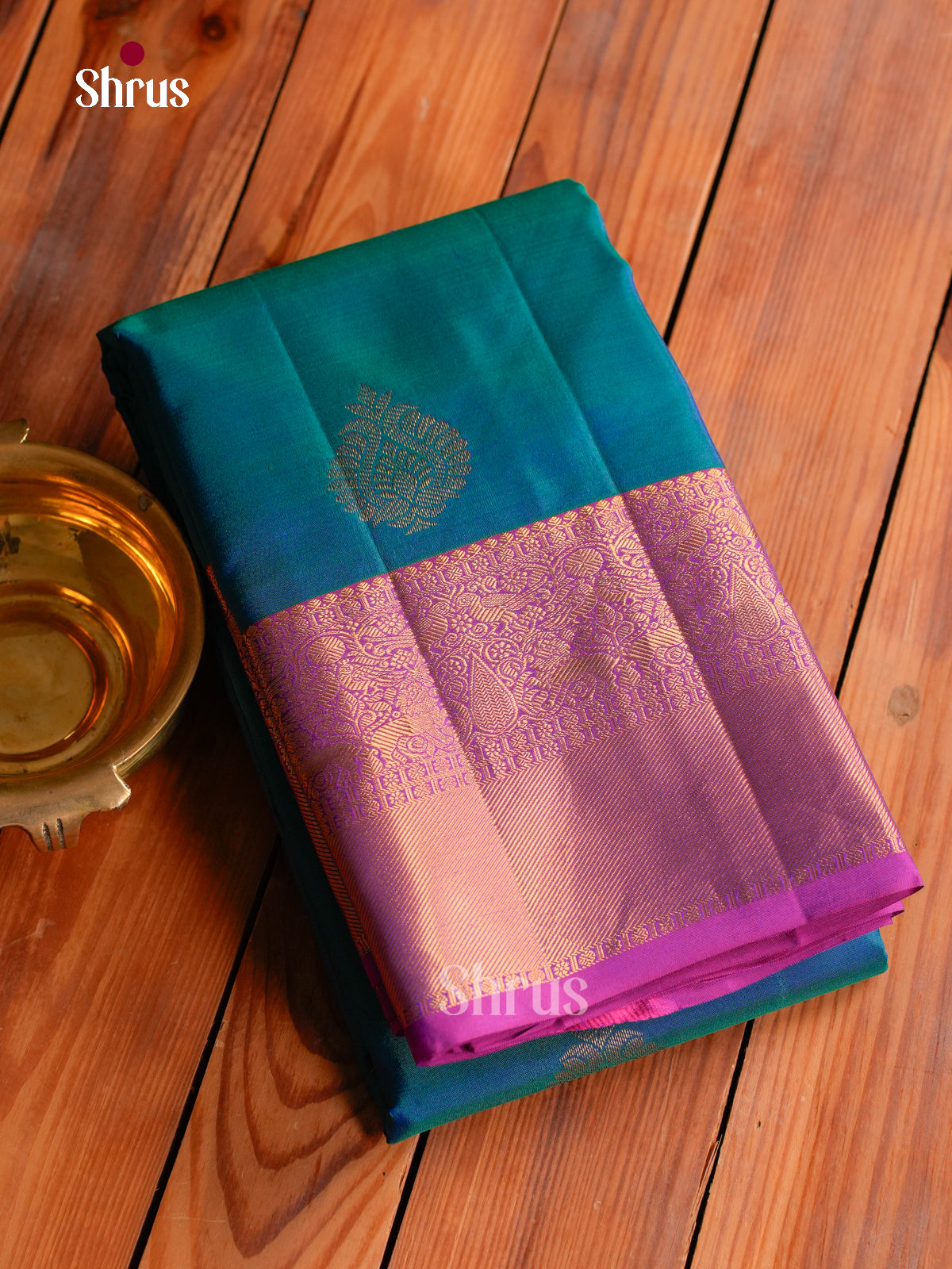 Elegant Peacock Blue Kanchipuram Saree With Paisley Leaf Motifs | Purple Zari Border & Pallu