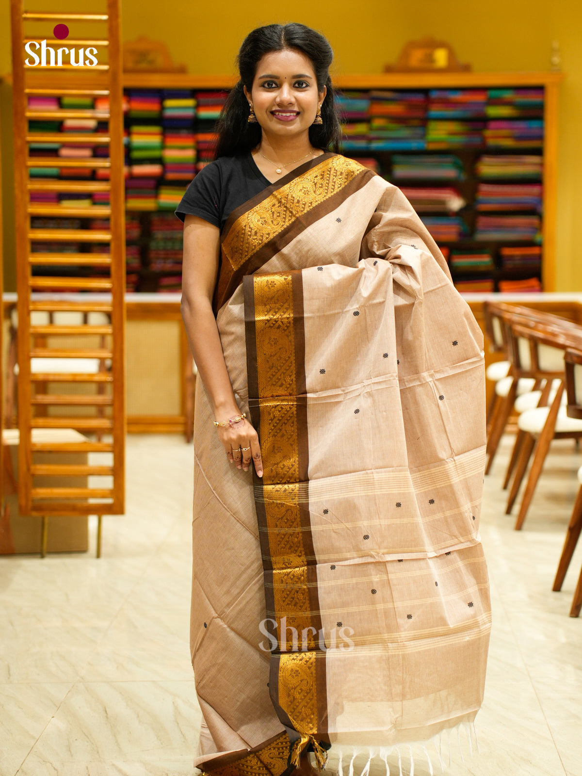 Enchanting Beige Chettinad Cotton Saree With Thread Buttas & Brown Zari Border