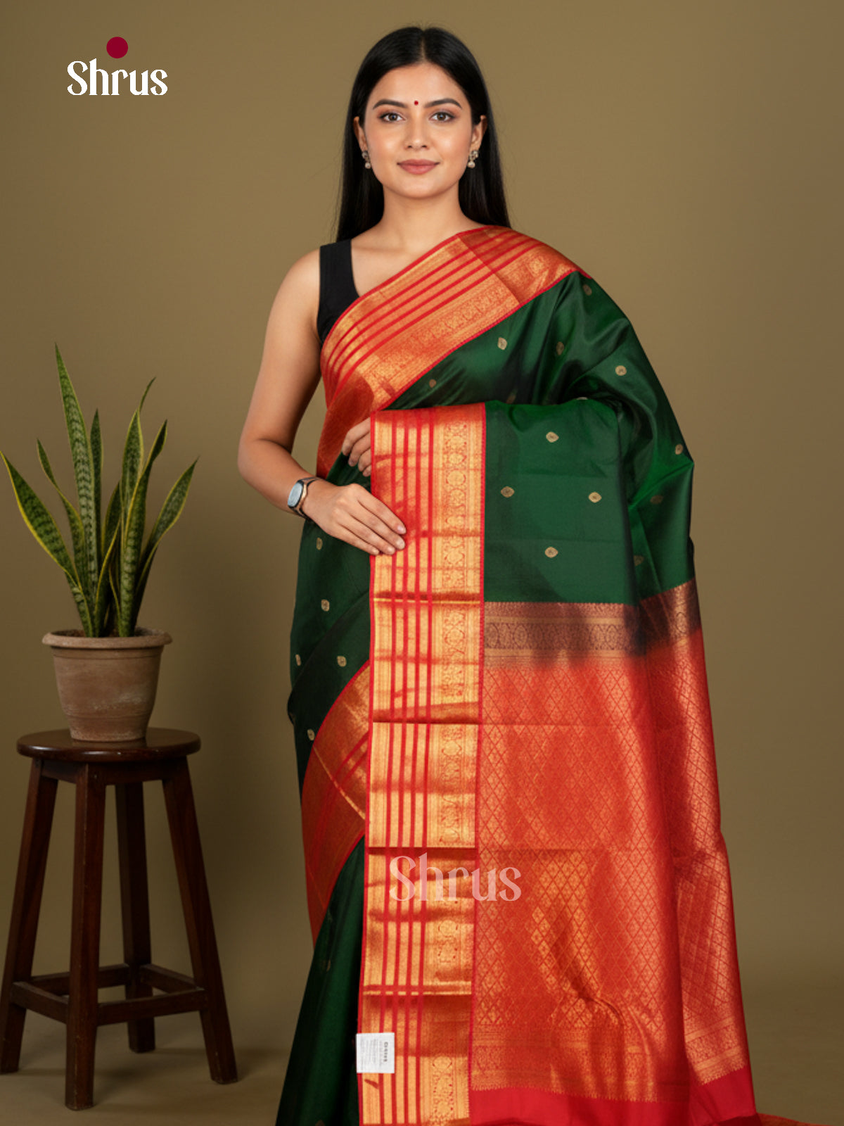 Buy Serene Green Kanchipuram Saree with Gold Buttas, Orange Striped Border & Brocade Pallu