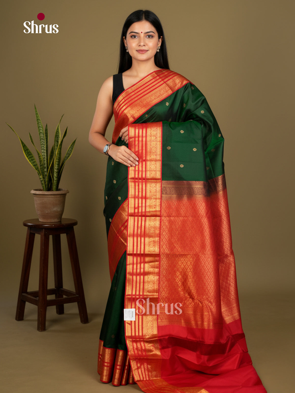 Buy Serene Green Kanchipuram Silk Saree with Gold Buttas, Orange Striped Border & Brocade Pallu