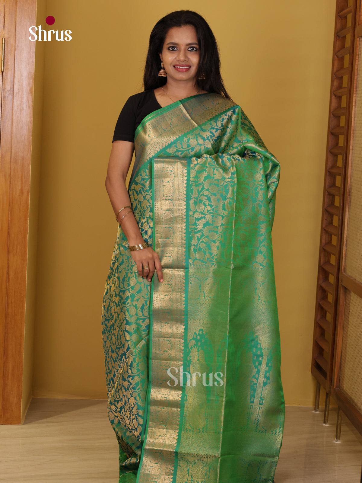 Buy Dazzling Green Soft Silk Saree with Zari Woven Vanashigaram Nestling Brocade