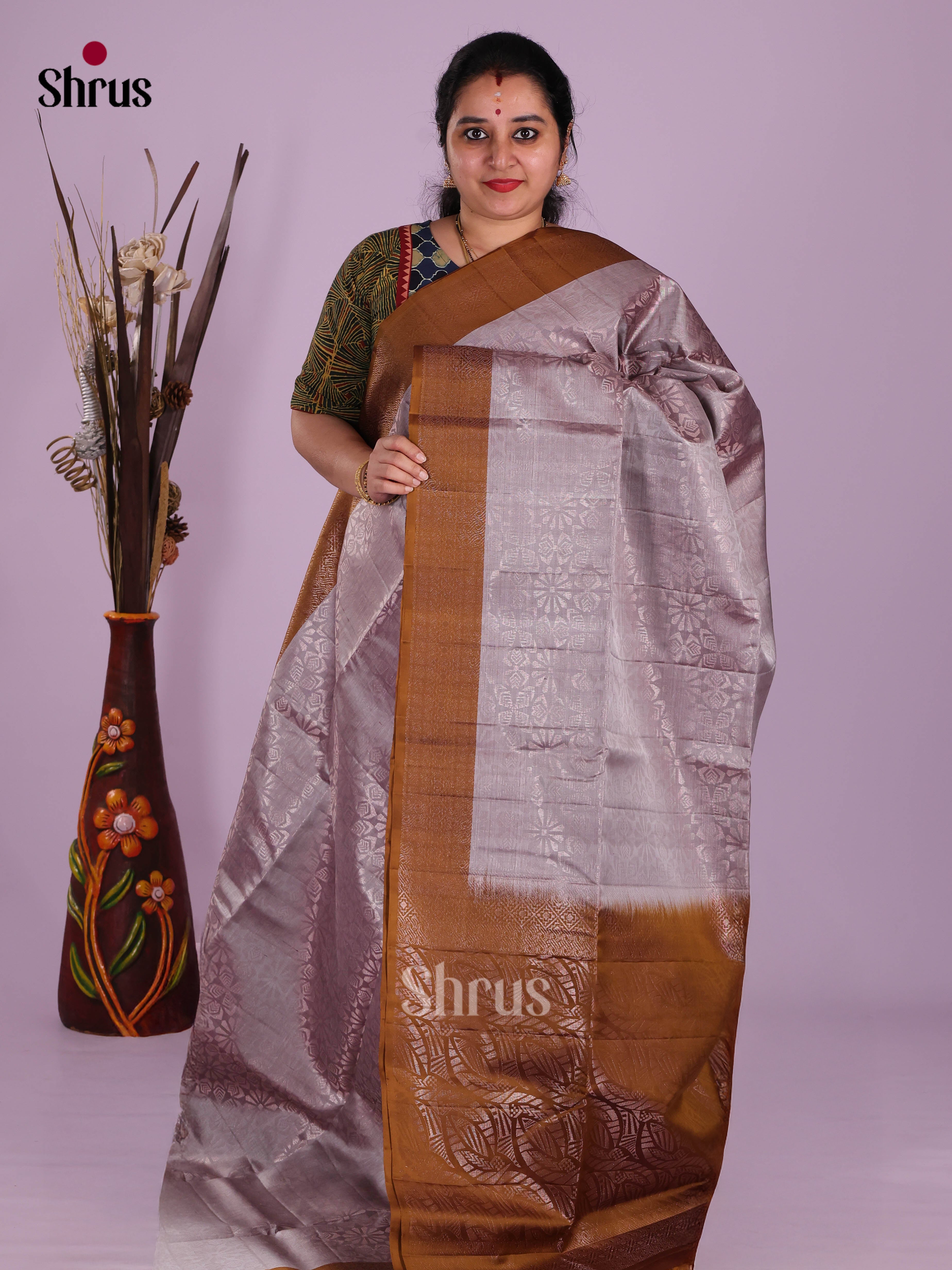 Buy Sheeny Lavender Grey Soft Silk Saree With Silver Zari Floral Body, Brown Border & Pallu