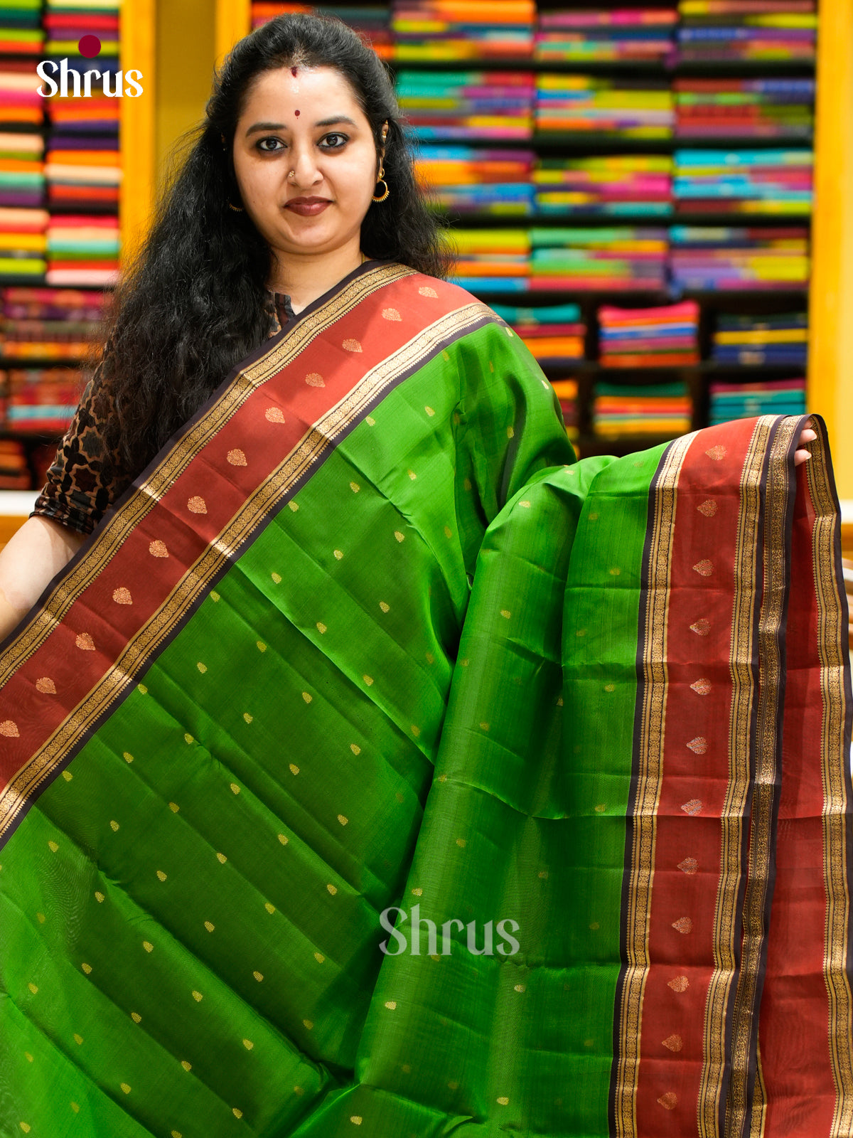 Vibrant Leaf Green Kanchipuram Sarees With Leaf Buttas, Maroon Rettaipet Border & Dark Purple Zari Pallu