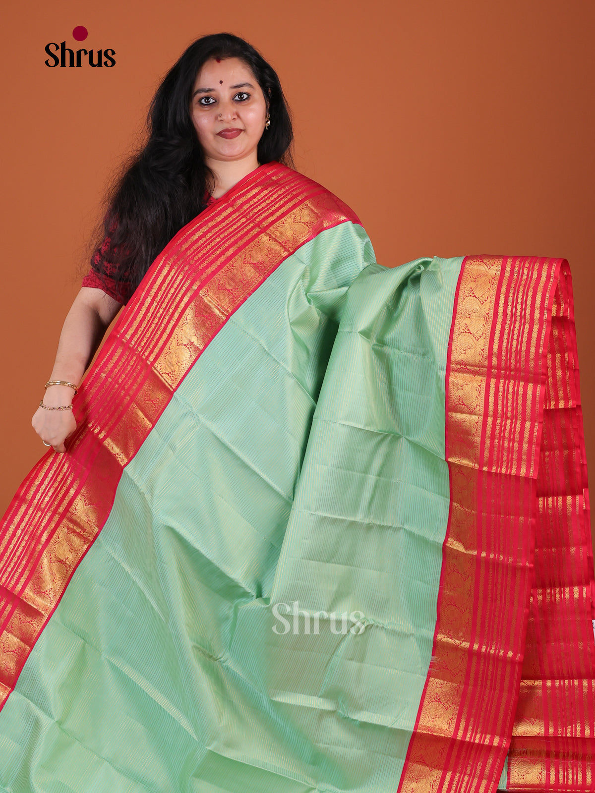 Luminous Pista Green Kanchipuram Pattu Saree With Fine Stripes | Red Zari Striped Border & Brocade Pallu