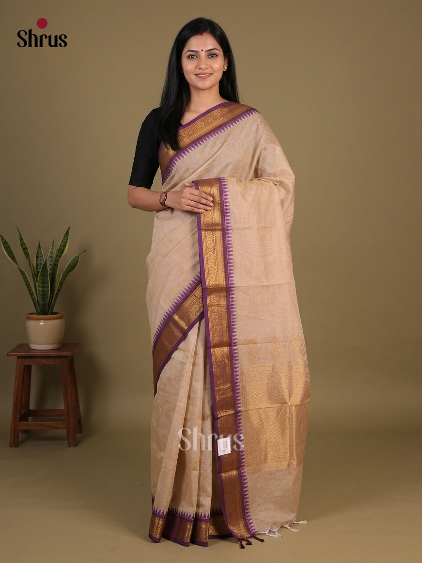 Lustrous Beige Chettinad Cotton Saree With Gold Buttas & Violet Temple Zari Border