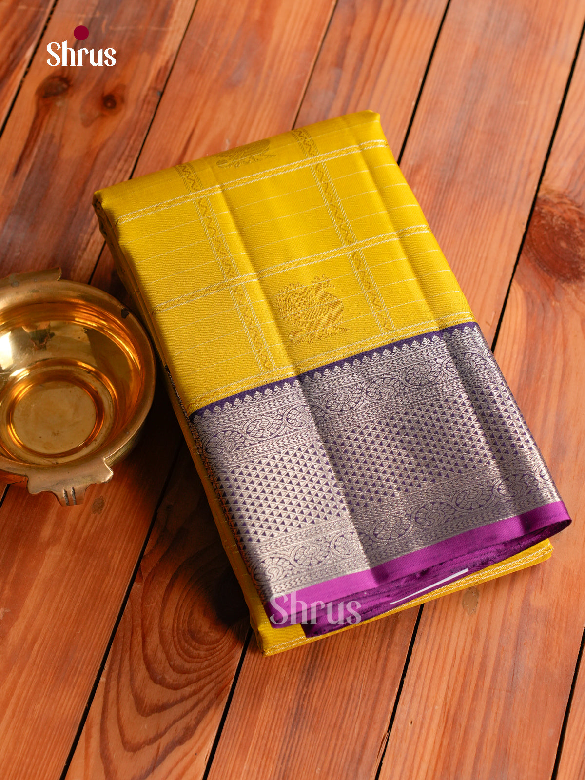 Luxurious Mustard Yellow Kanchipuram silk Saree With Silver Grid Kattams, Buttas & Eggplant Zari Border