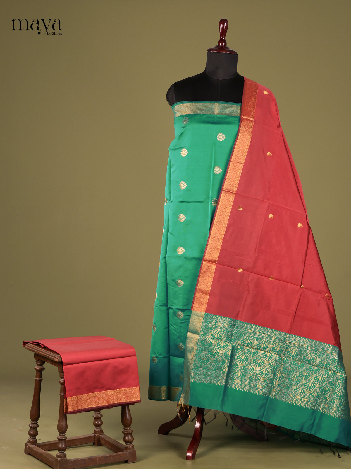 Beautiful Green semi softsilk salwar untitched with Orange dupatta