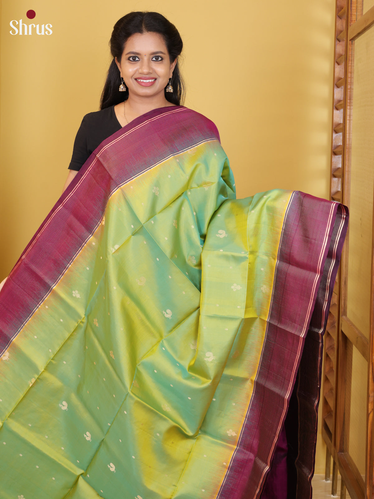 Buy Graceful Manthulir Green Pure Soft Silk Saree with Peacock Buttas, Purple Zari Striped Border & Pallu