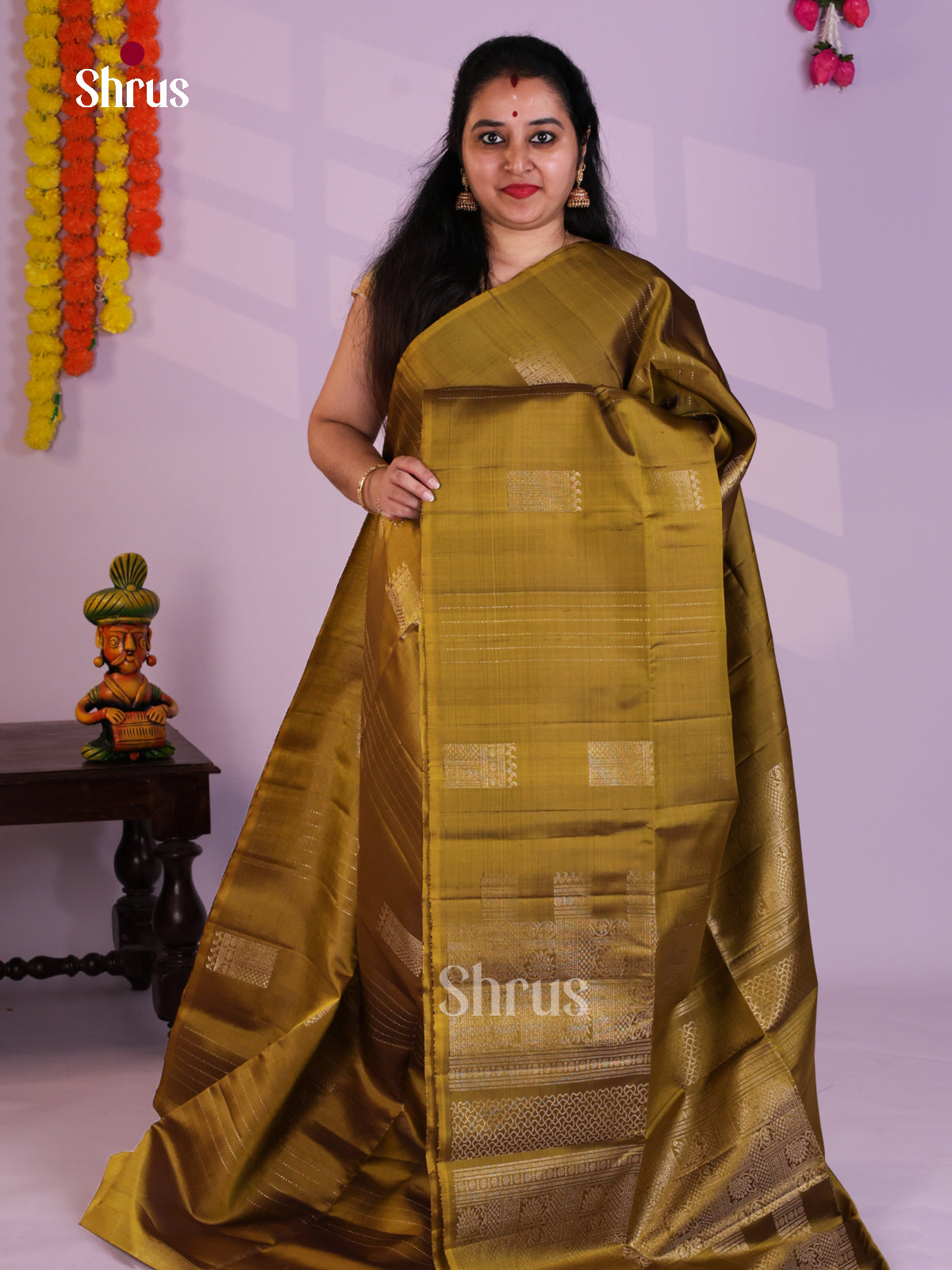 Buy Exquisite Mehandi Green Soft Silk Saree with Zari Motifs & Brocade Pallu