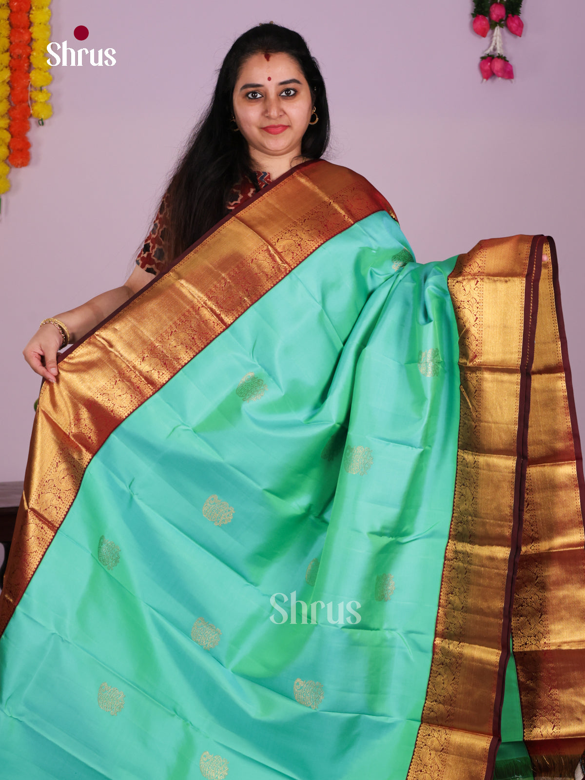 Buy Splendid Mint Green Kanchipuram Saree with Golden Motifs, Maroon Zari Border & Brocade Pallu