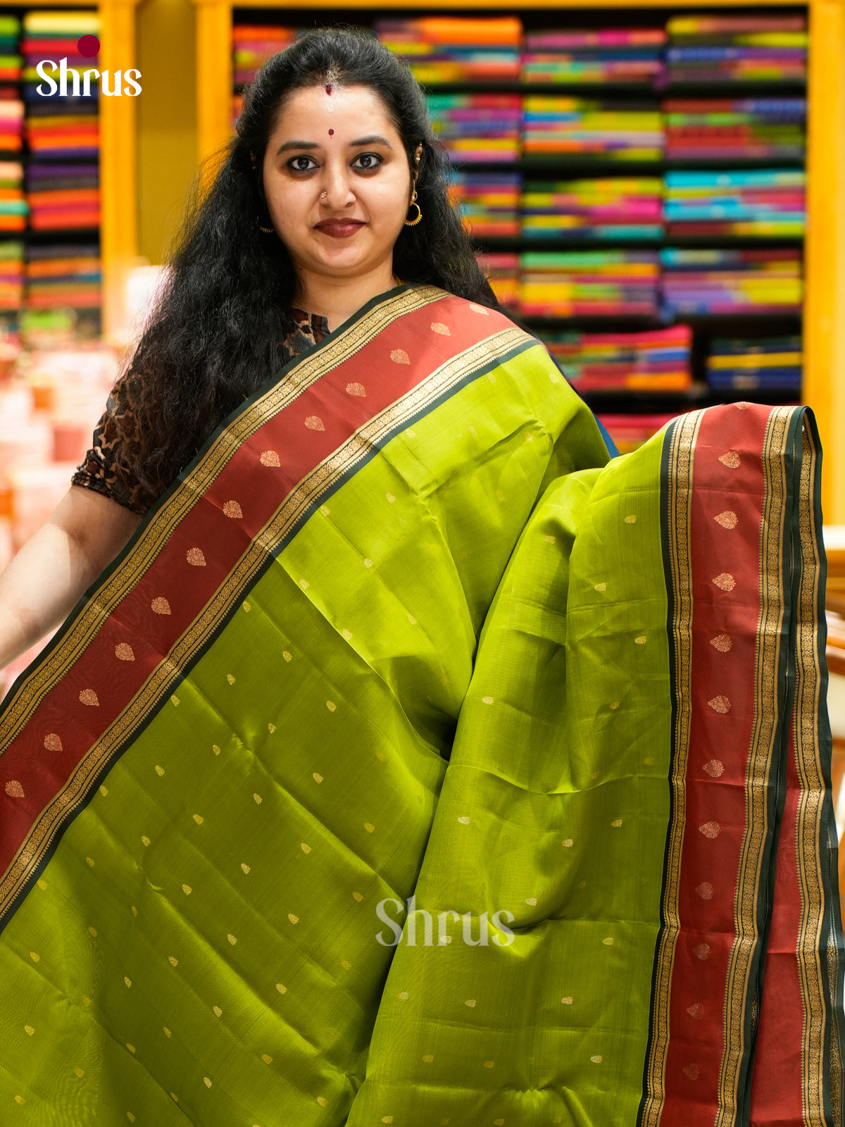 Vivid Olive Green Halfpure Kanchipuram Sarees With Leaf Buttas & Maroon Rettaipet Zari Border