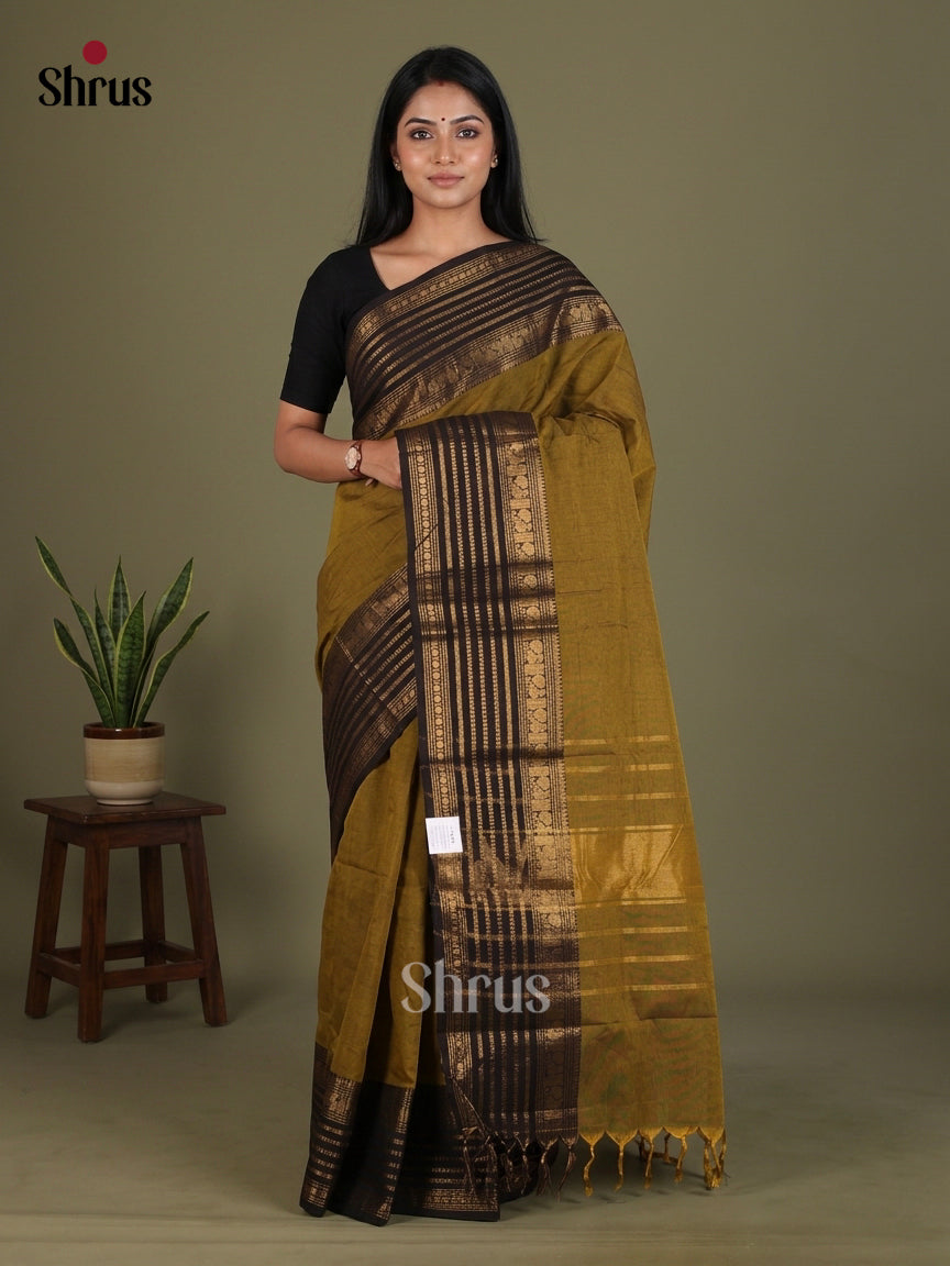 Opulent Mustard Chettinad Cotton Saree With Plain Body, Black Zari Striped Border & Chit Pallu