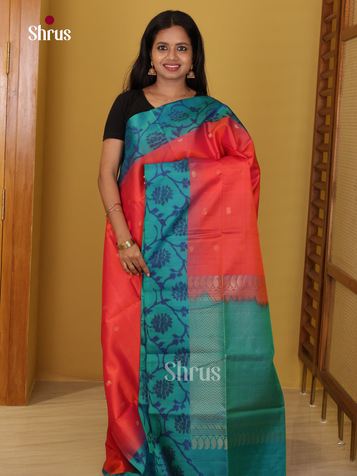 Buy Luminous Orange Soft Silk Saree with Zari Buttas & Teal Blue Pochampally Ikkat Floral Border