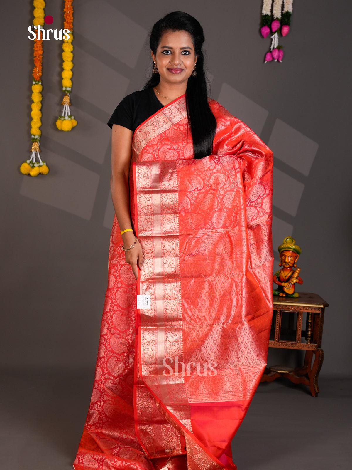 Buy Radiant Orangish Pink Kanchipuram Silk Saree with Zari Woven Paisley Brocade & Traditional Border