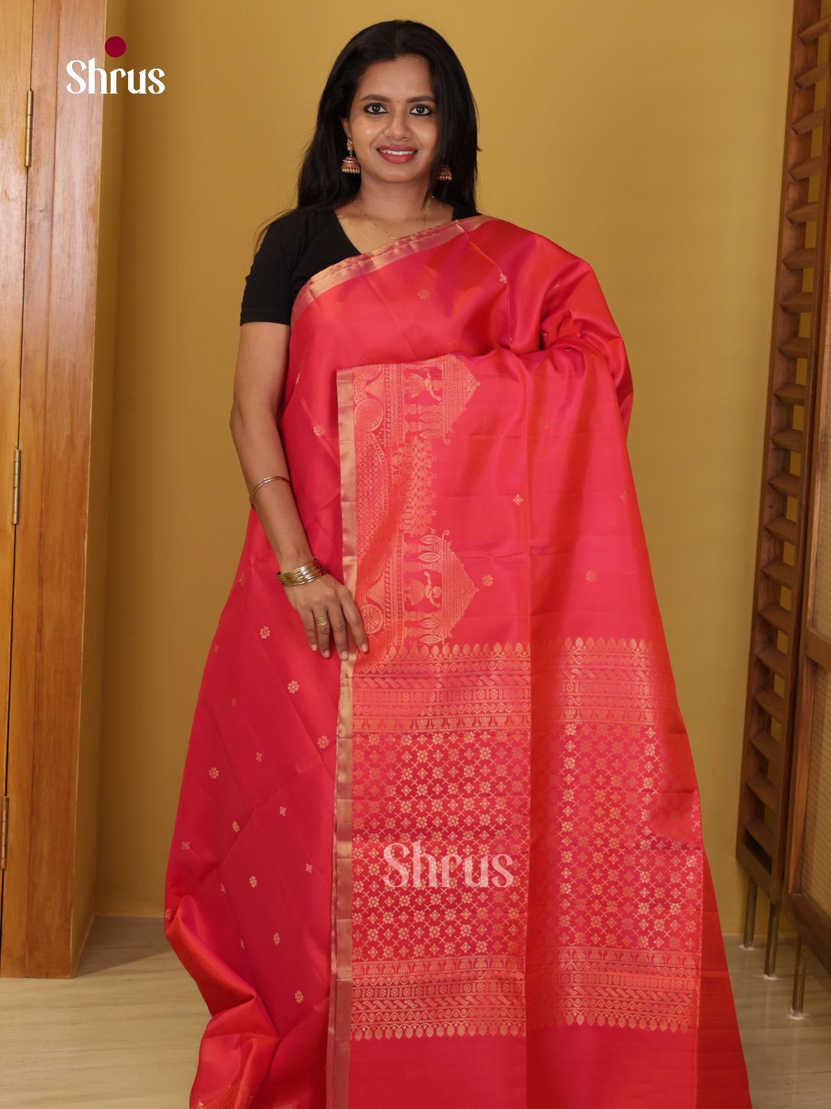 Buy Radiant Orangish Pink Soft Silk Saree with Floral Buttas & Intricately Woven Rath Motifs