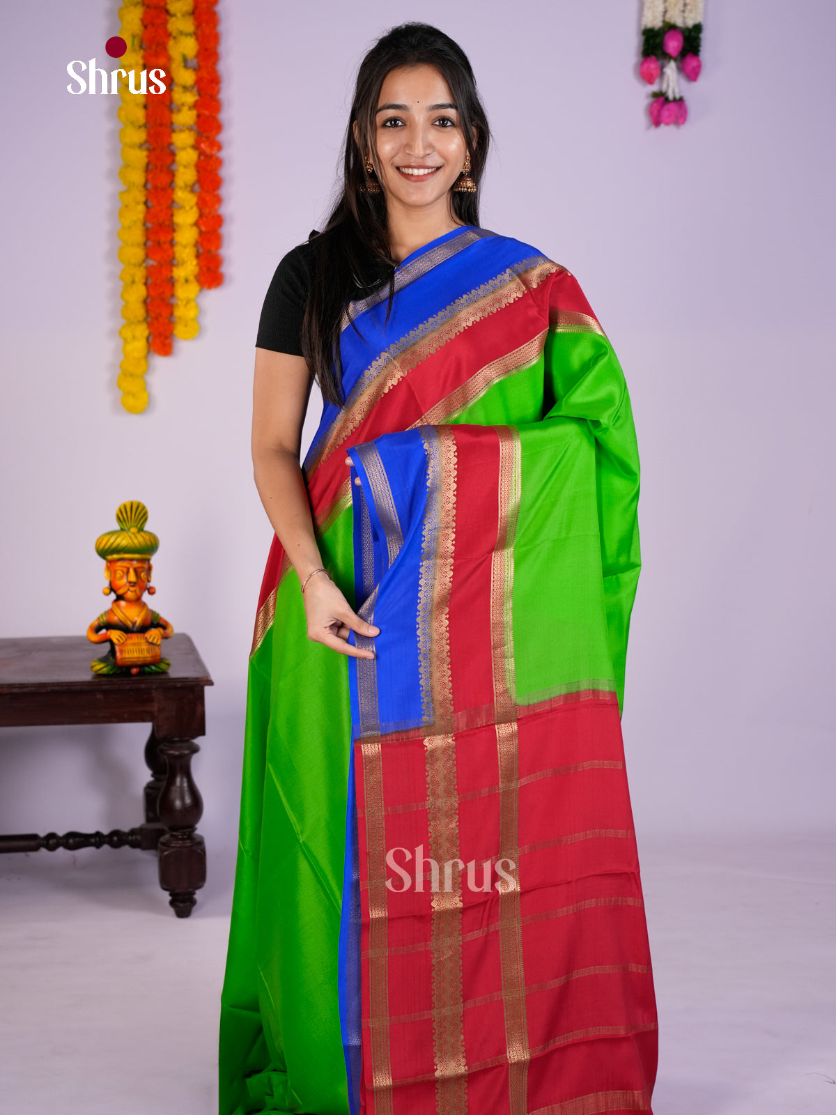 Buy Serene Parrot Green Mysore Silk Saree with Blue & Red Double Border And Traditional Pallu