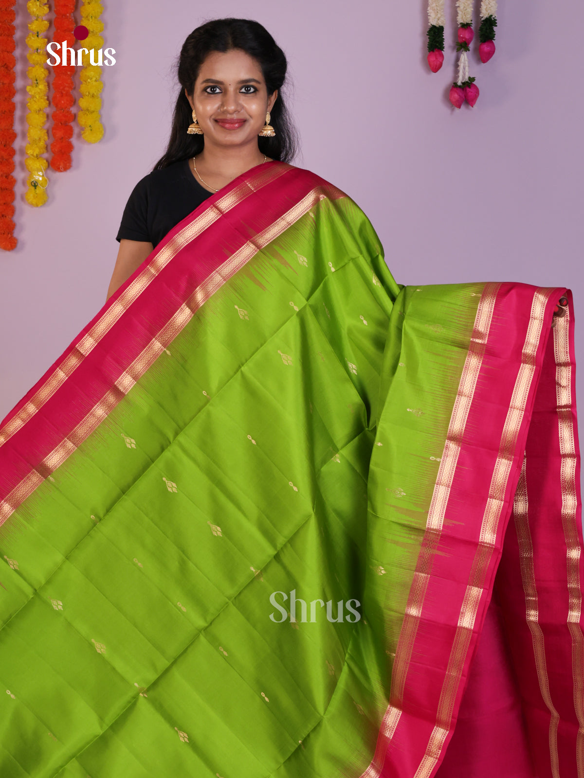 Buy Beautifully Chic Parrot Green Pure Soft Silk Saree gleams with zari floral buttas & Rettaipet Border