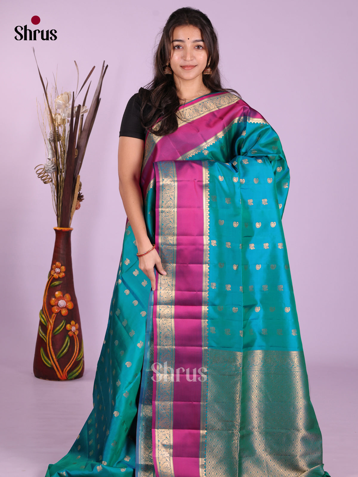 Splendid Peacock Blue Soft Silk Saree With Golden Buttas & Magenta Rettaipet Zari Border