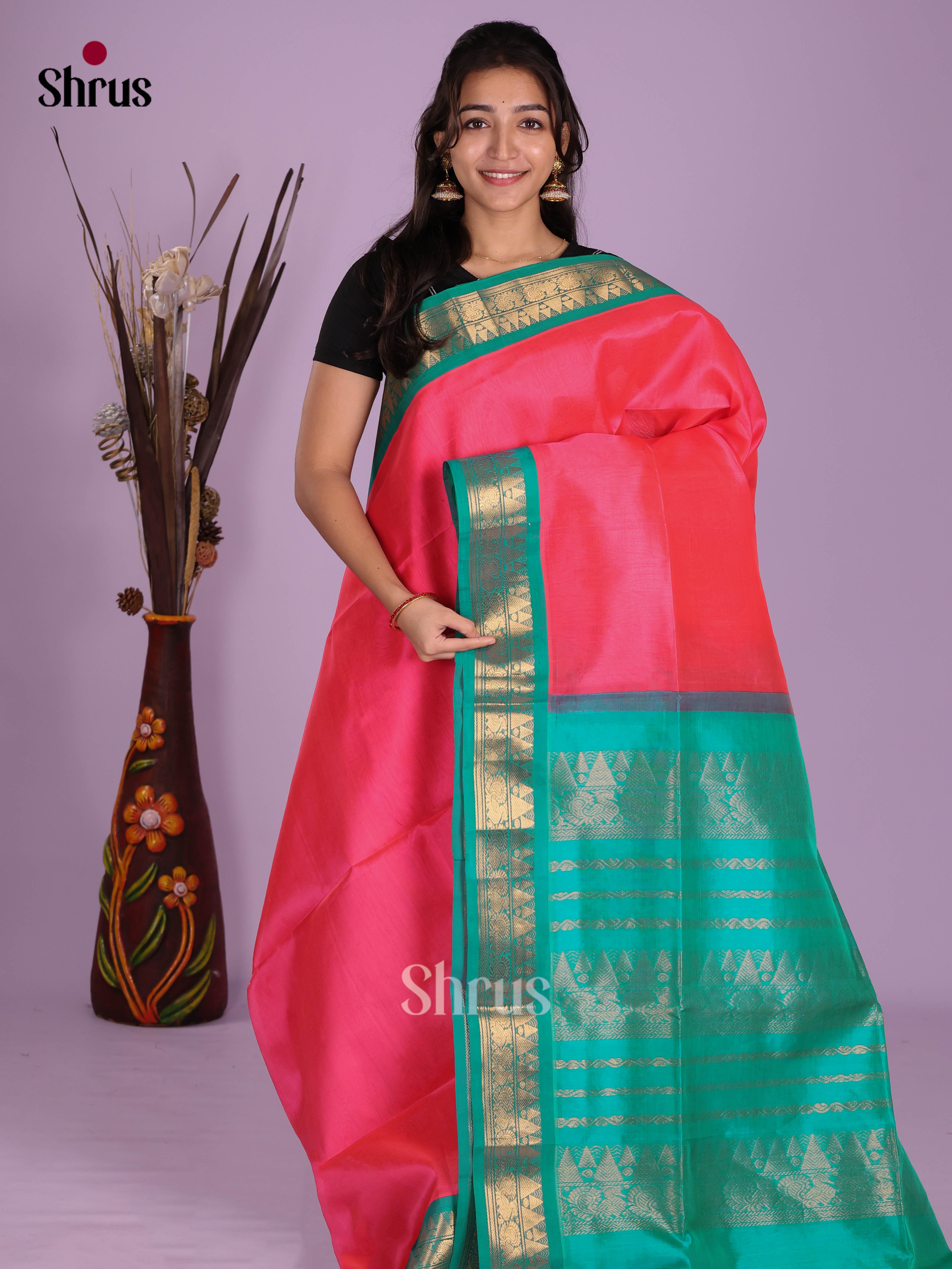 Buy Elegant Pink Silk Cotton Saree with Plain Body, Teal Border And Zari Pallu