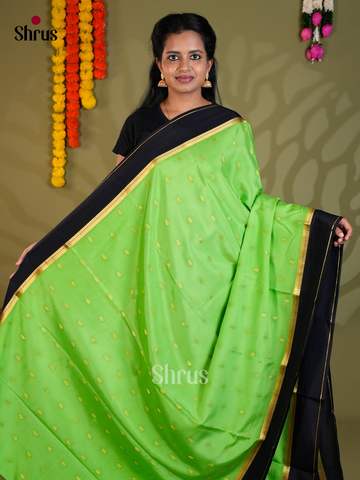 Buy Beautiful Pista Green Pure Mysore Silk Saree with Zari Buttas, Black Rettaipet Border & Pallu