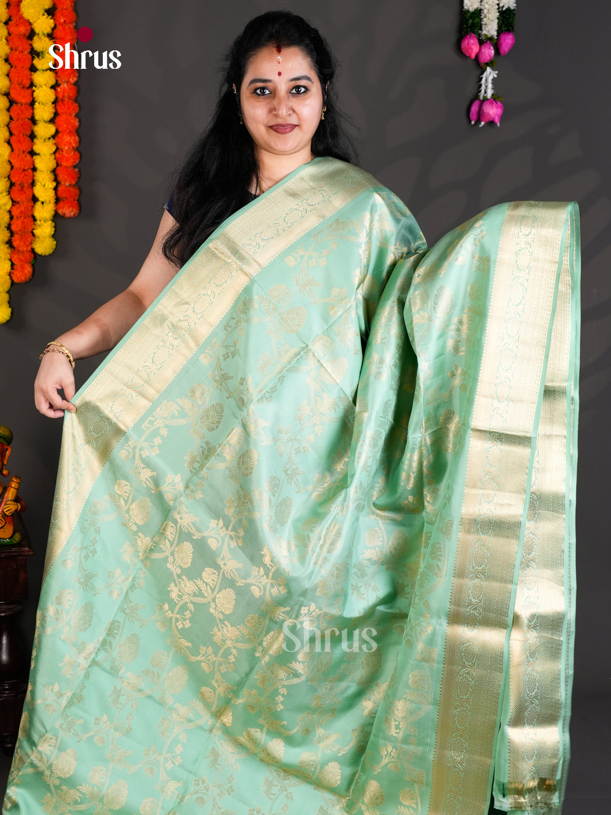 Buy Charming Pista Green Pure Soft Silk Saree with Floral Nestling Brocade & Zari Border