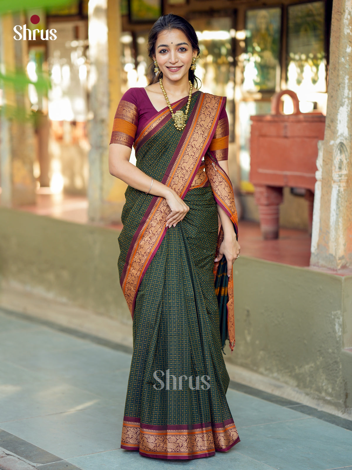 Pretty Dark Green Chettinad Cotton Saree With Intricate Checks, Buttas & Maroon Zari Border