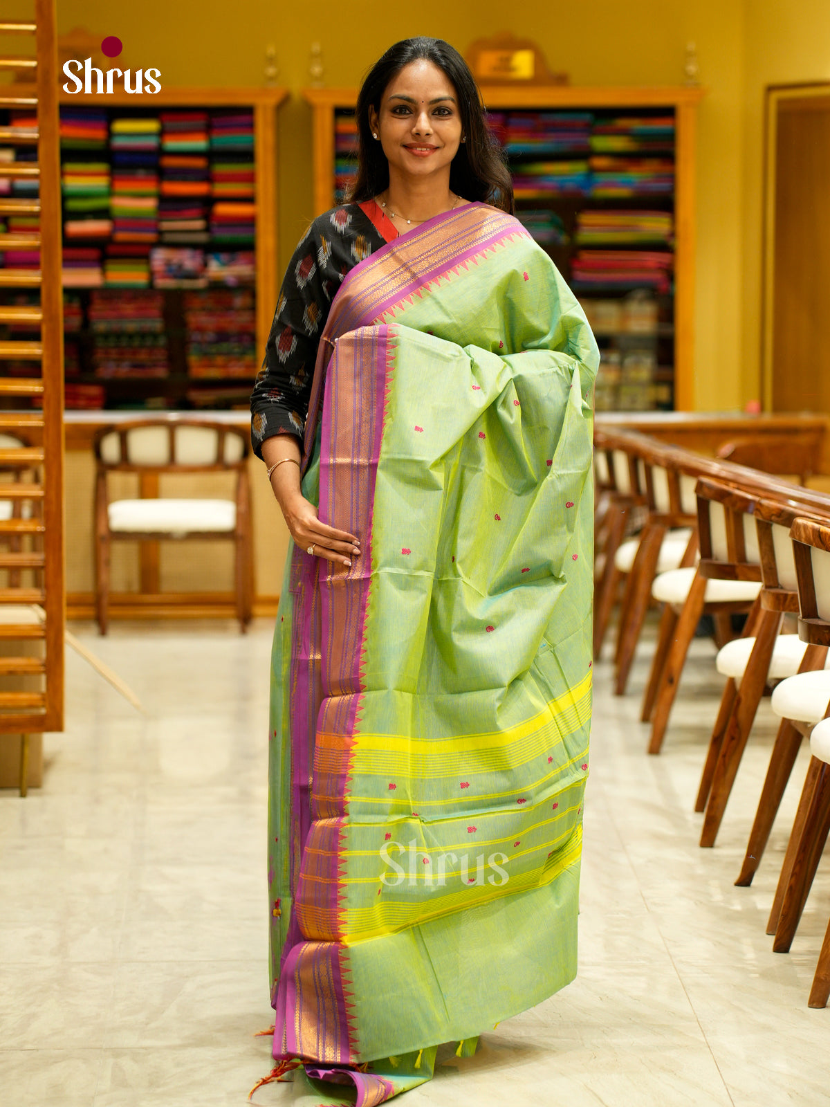 Pretty Light Green Chettinad Cotton Saree With Thread Buttas & Purple Temple Zari Border