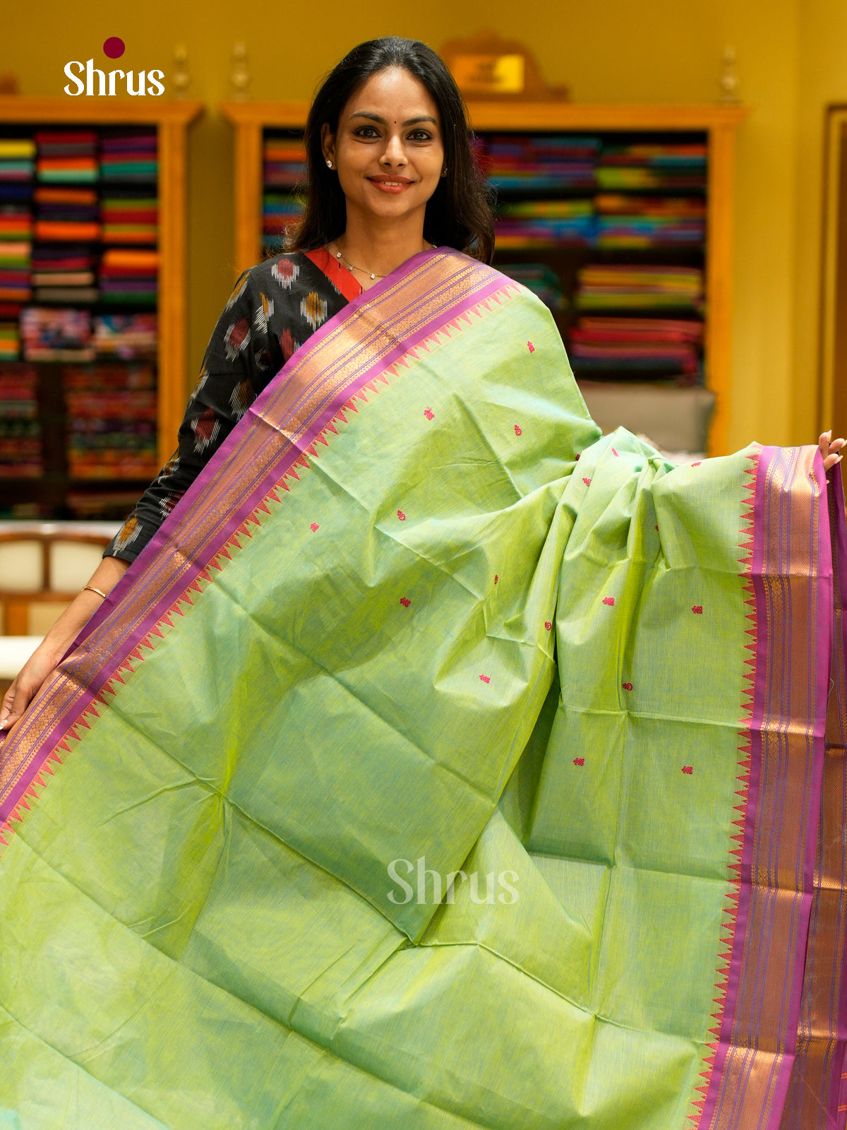 Pretty Light Green Chettinad Cotton Sarees With Thread Buttas & Purple Temple Zari Border