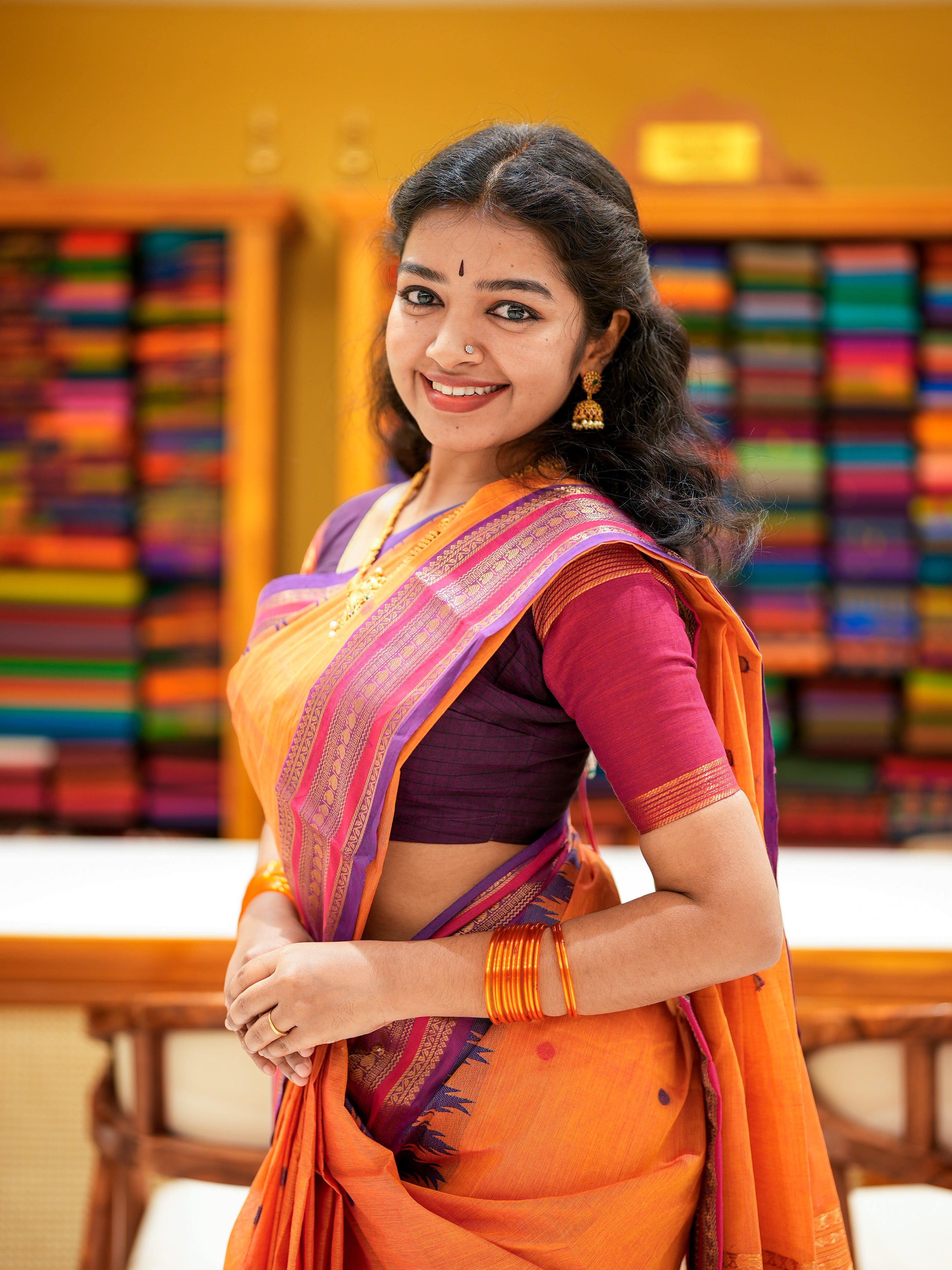 Pretty Orange Chettinad Cotton Sarees with Thread Buttas & Purple Temple Zari Border
