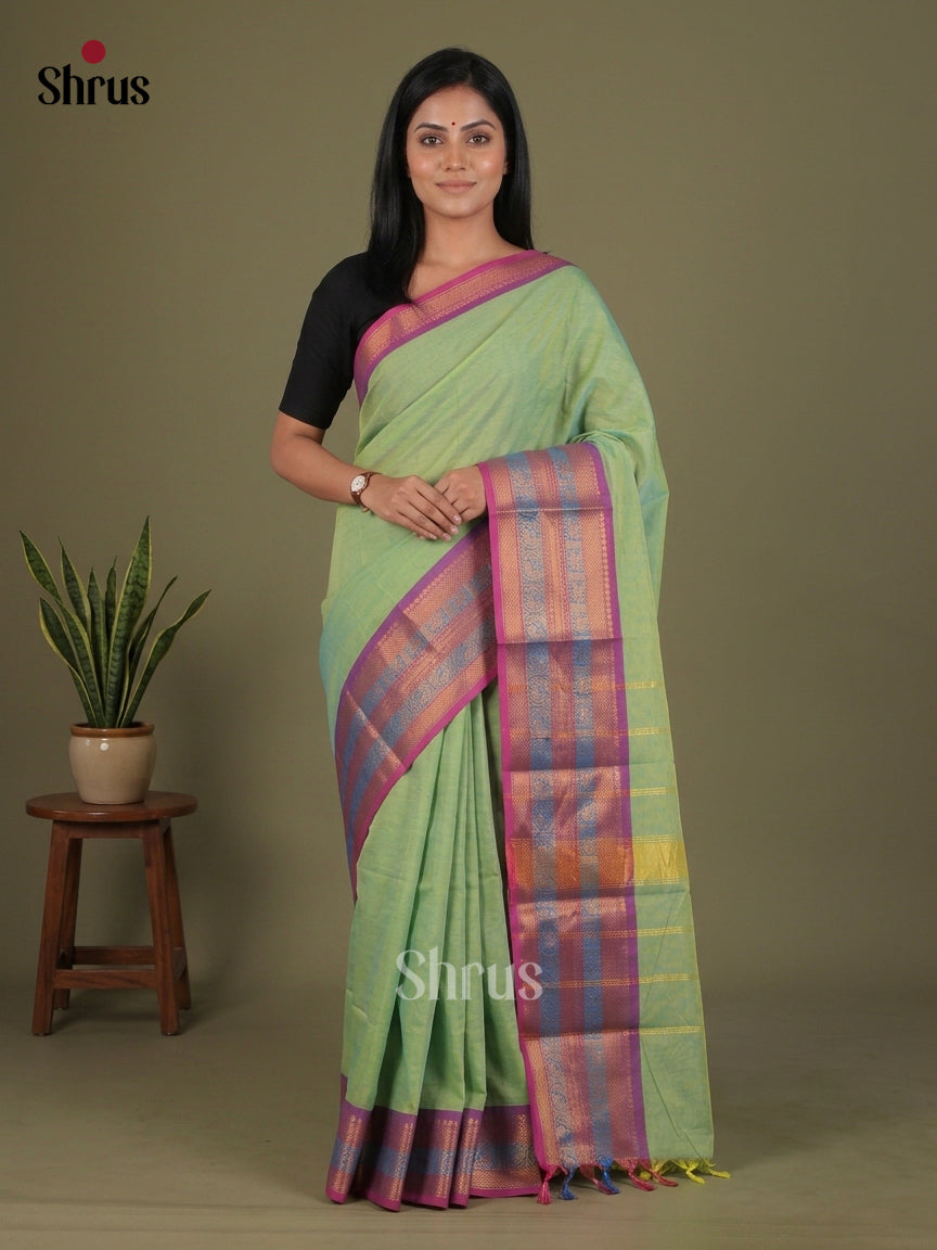 Pretty Pista Green Chettinad Cotton Saree With Magenta Zari Woven Broad Border
