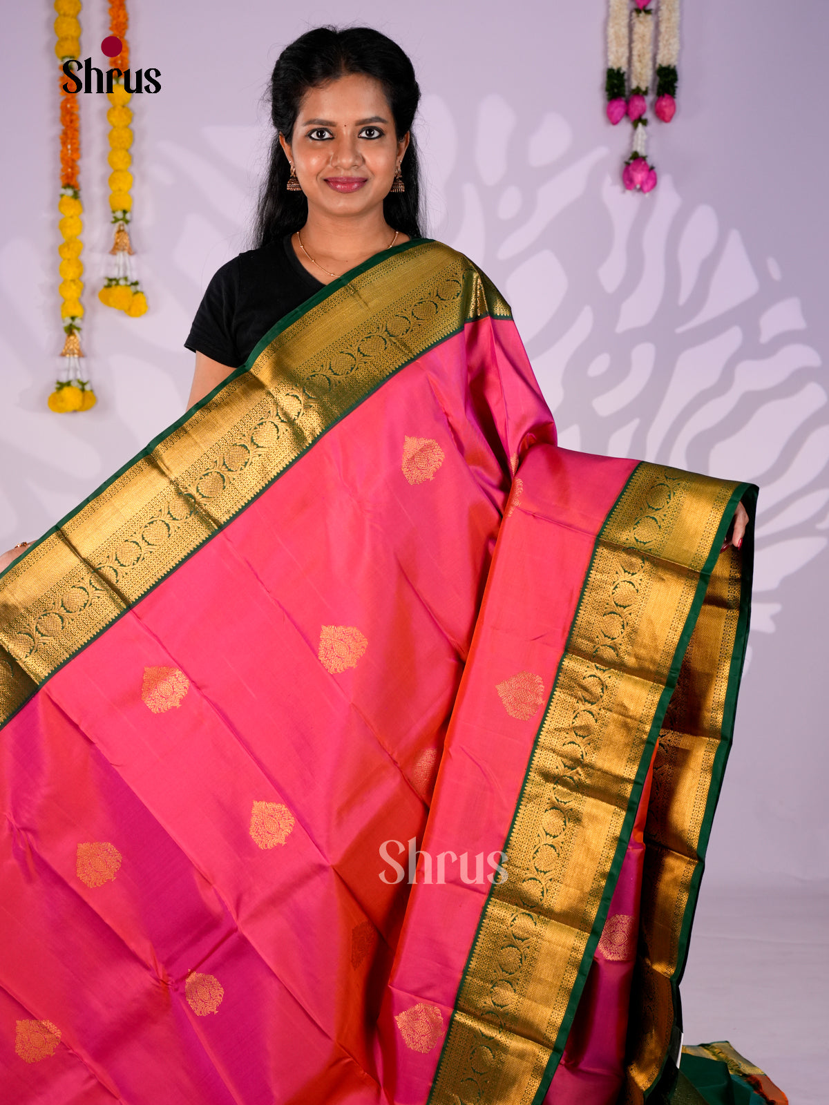 Buy Alluring Rani Pink Kanchipuram Saree with Paisley Buttas, Bottle Green Zari Border & Brocade Pallu