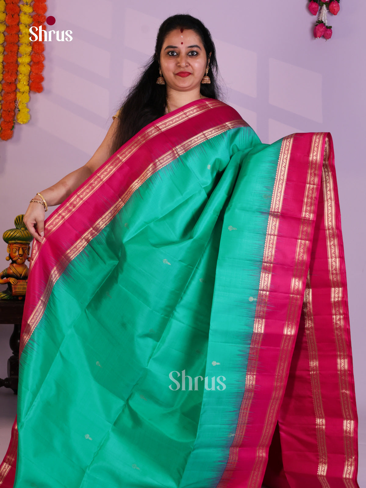 Buy Luminous Sea Green Pure Soft Silk Saree with Floral Buttas, Pink Rettaipet Zari Border & Brocade pallu