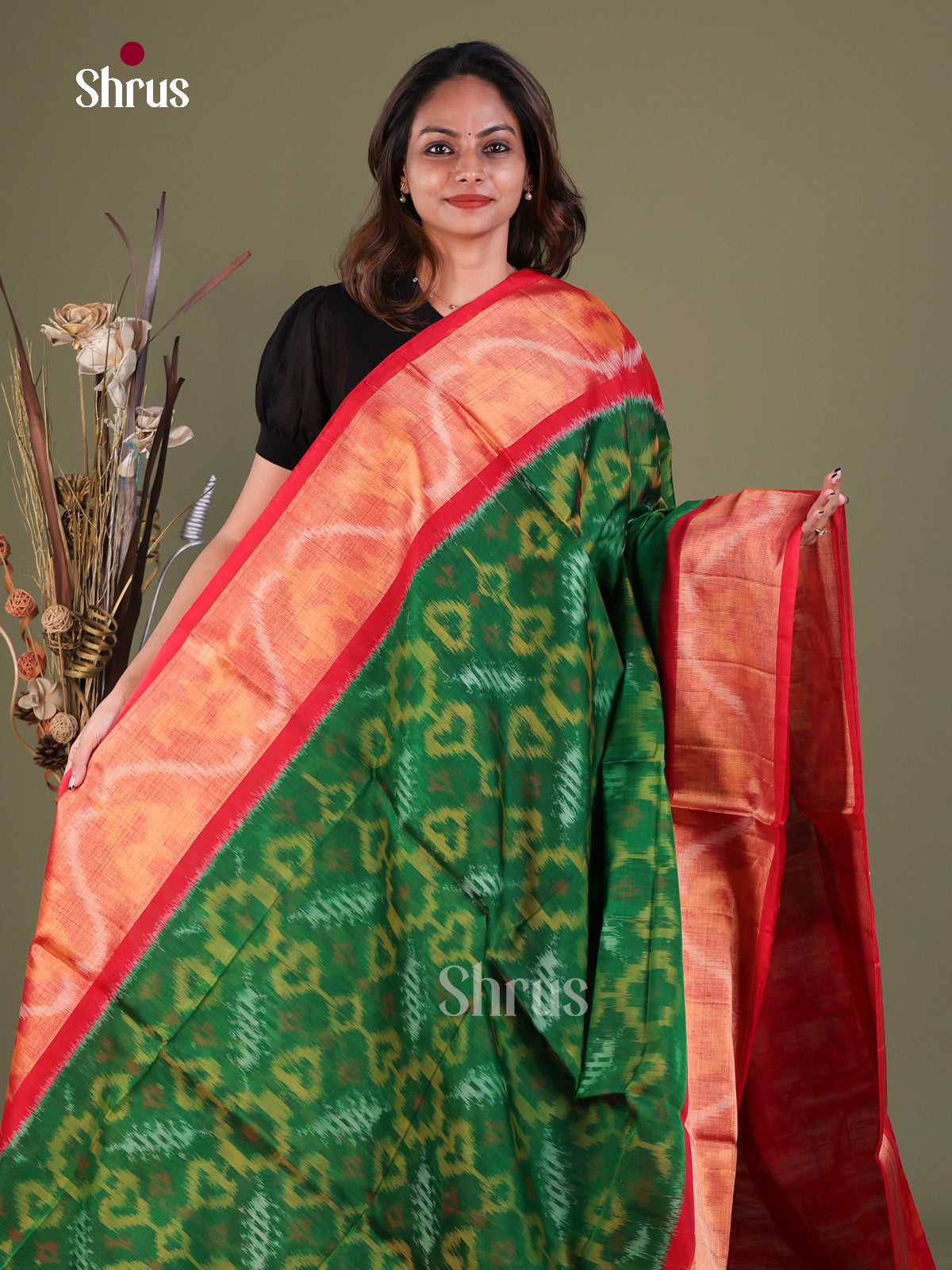 Serene Bottle Green Pochampally Cotton Silk Saree With Abstract Ikat Prints & Red Zari Border