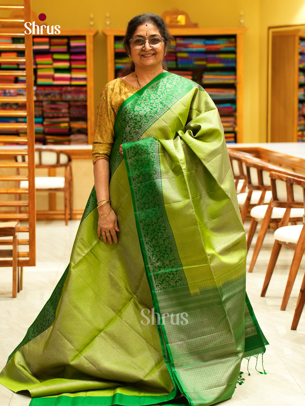 Serene Light Green Soft Silk Saree with Stripes and Zigzag Buttas | Dark Green Contrast Border