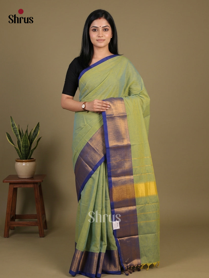 Serene Pista Green Chettinad Cotton Saree With Plain Body & Blue Broad Zari Border