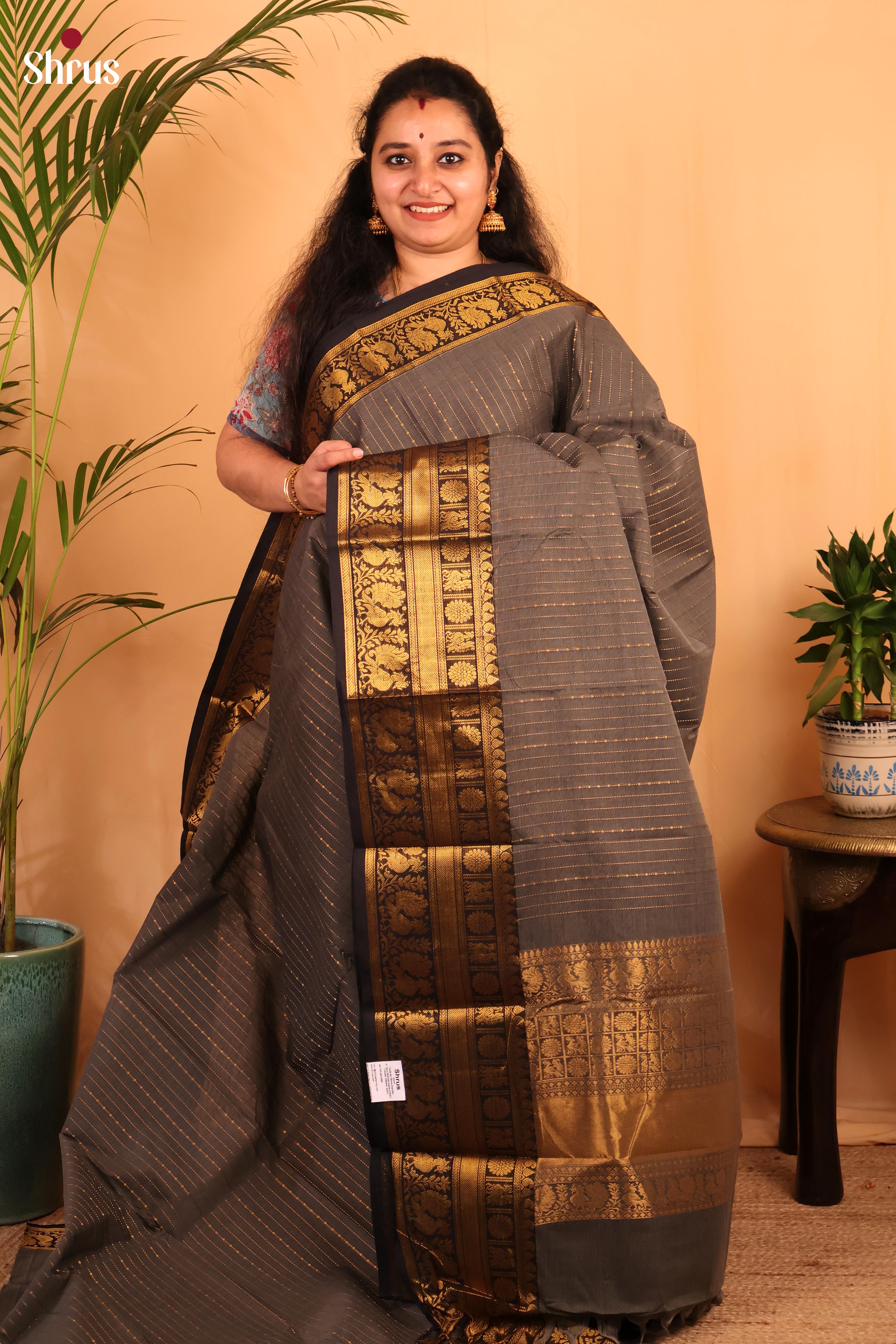 Sheeny Grey Chettinad Cotton Saree With Golden Stripes & Black Grand Zari Woven Pallu