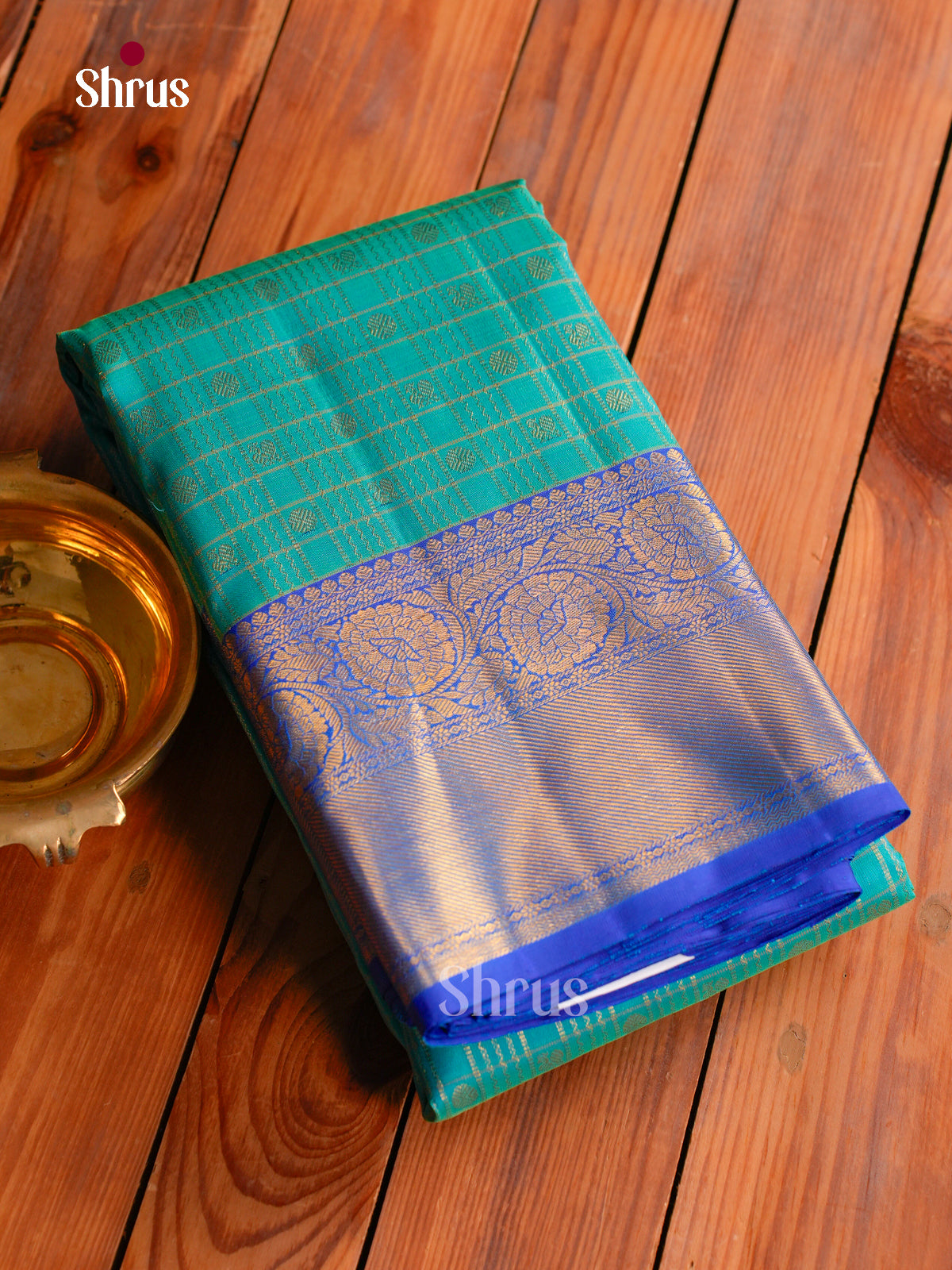 Sheeny Sea Green Kanchipuram silk Saree With Gold Checks & Buttas | Royal Blue Zari Border