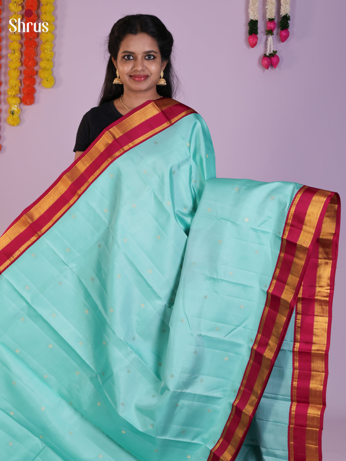 Buy Mesmerizing Sky Blue Kanchipuram Saree With Gold Buttas, Magenta Rettapet Border & Pallu
